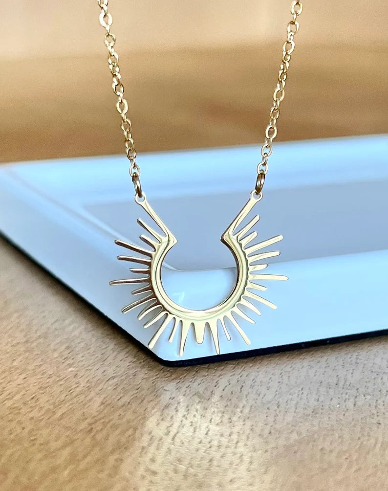 Gold sun necklace