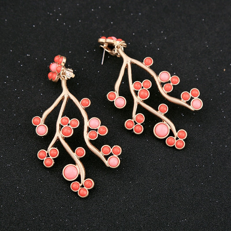 Green flower branch earrings