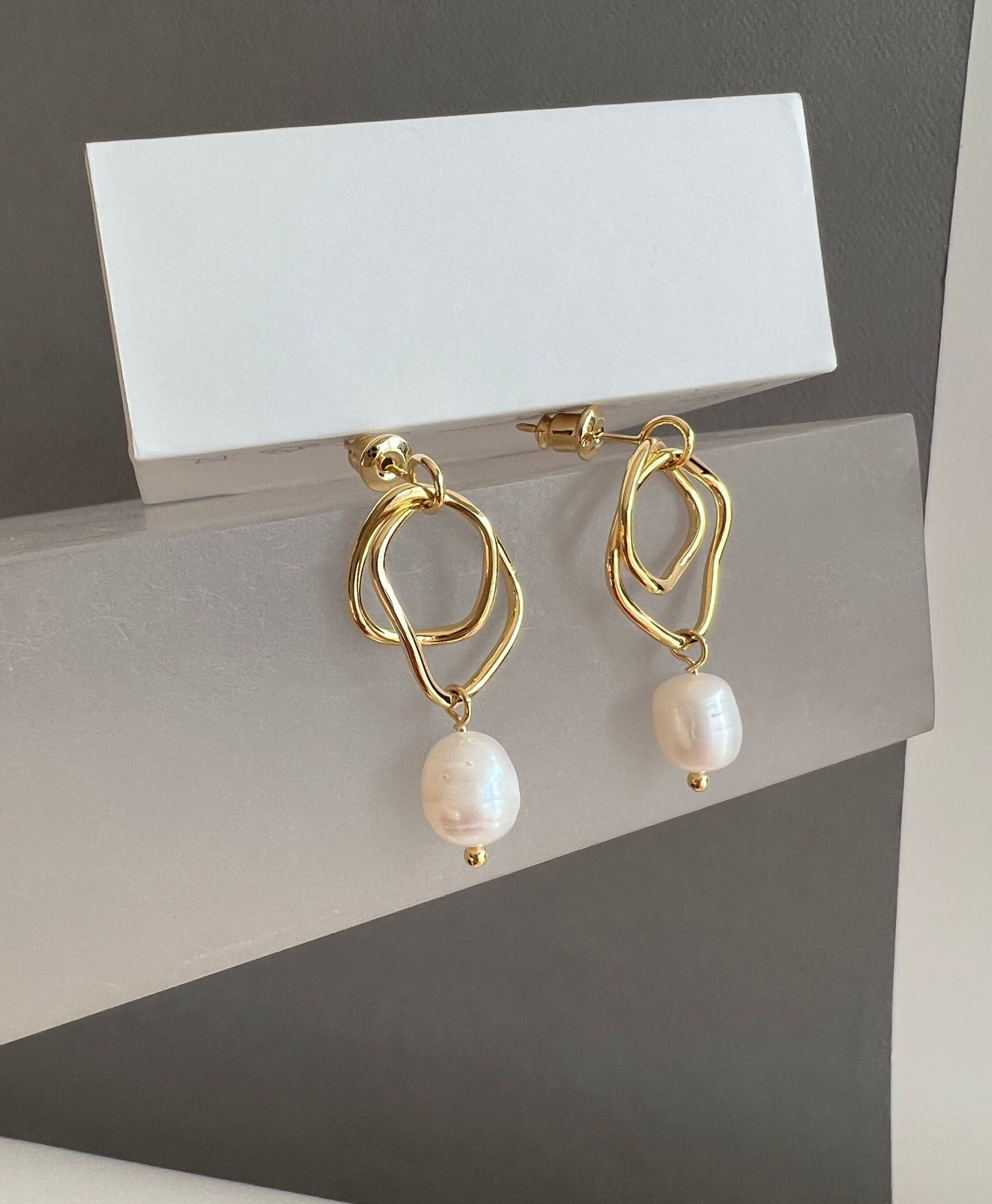Gold design pearl earrings