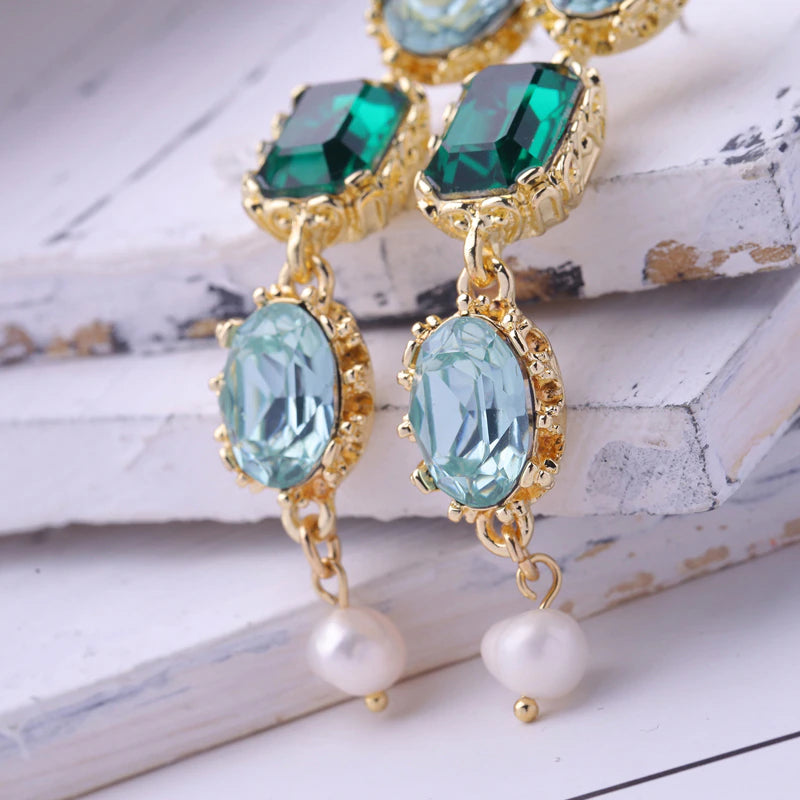 Green crystal long drop earrings