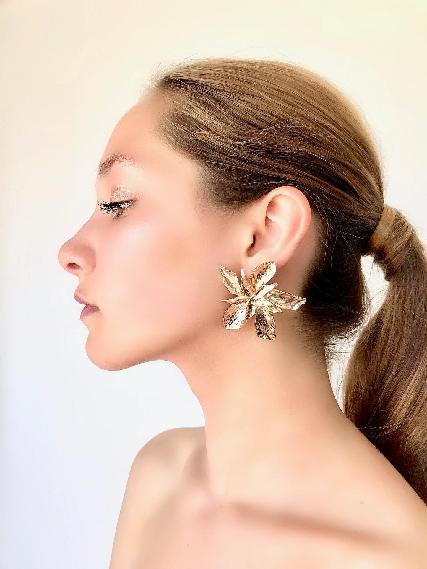 Large gold flower earrings