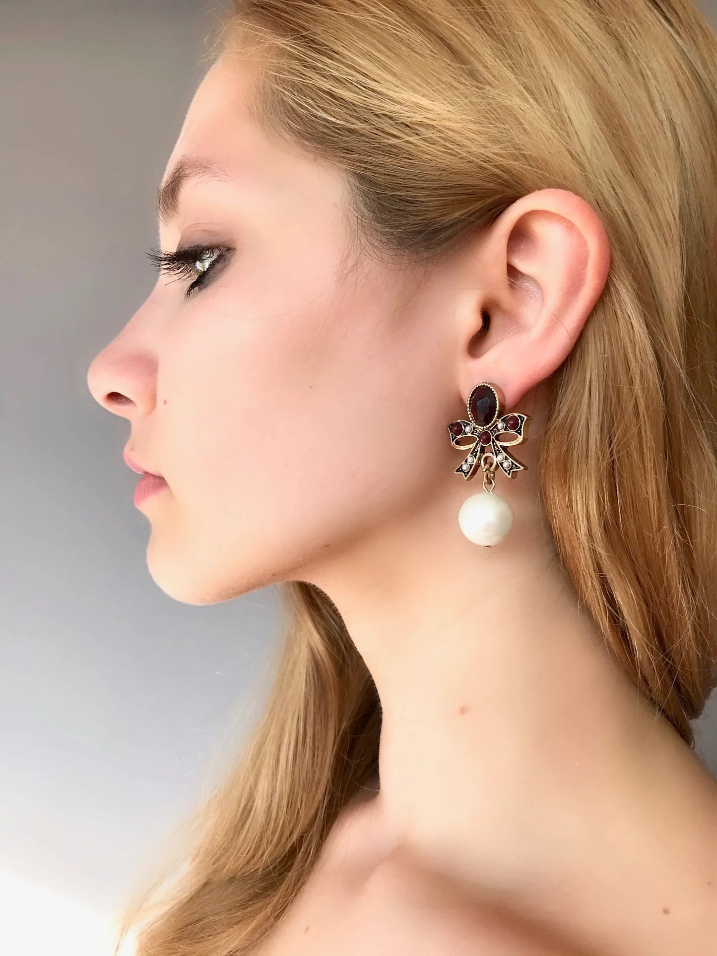 Statement pearl bow earrings