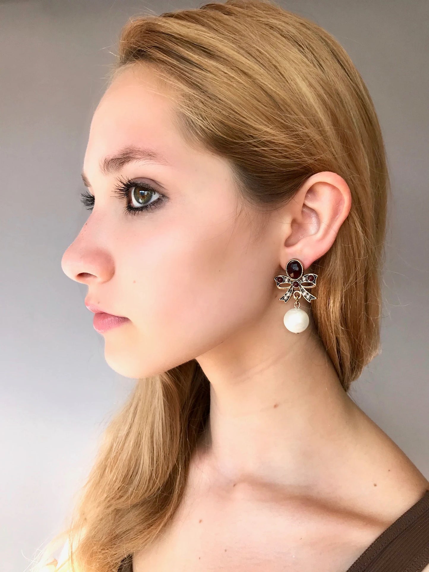 Statement pearl bow earrings