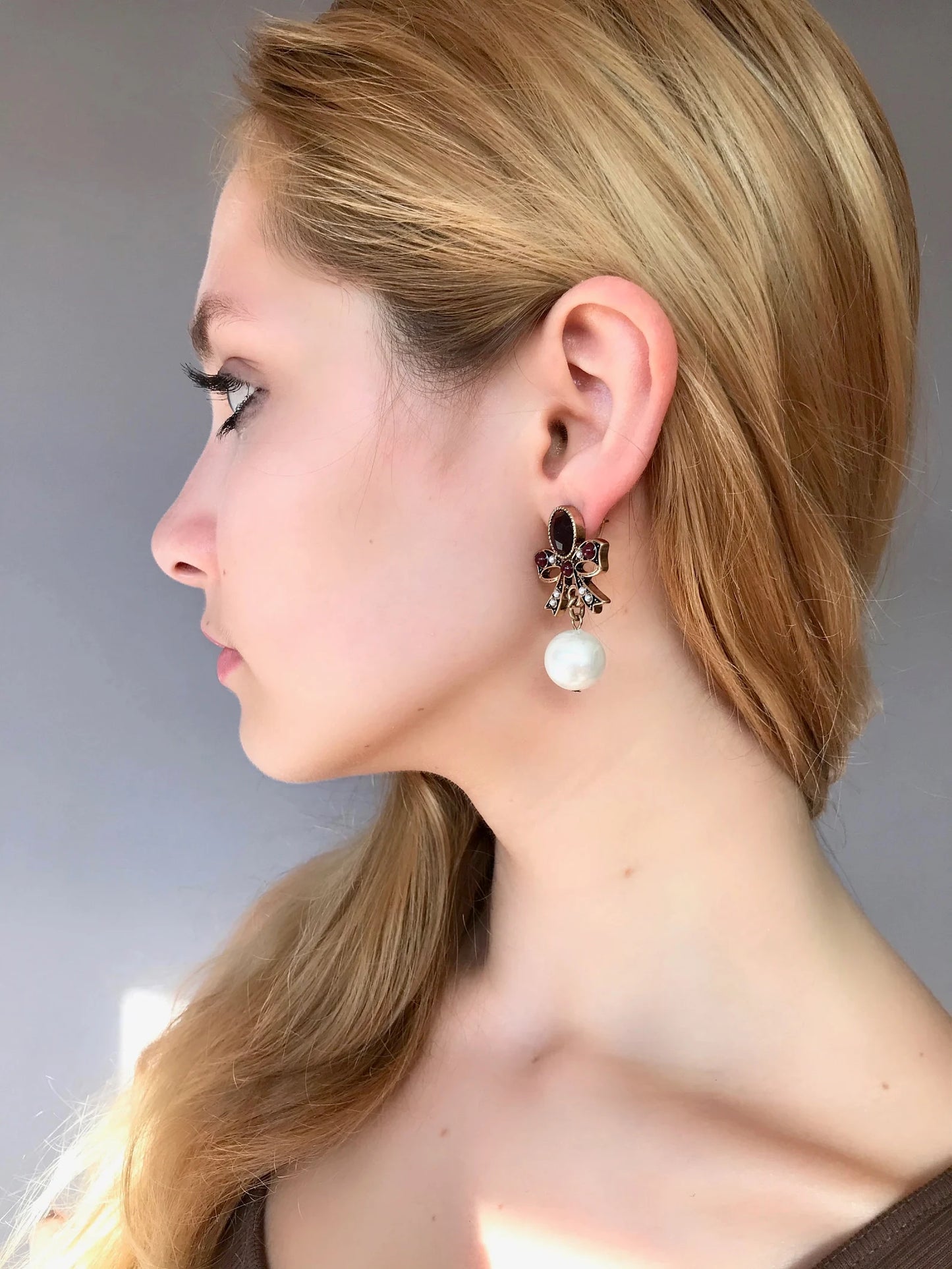 Statement pearl bow earrings