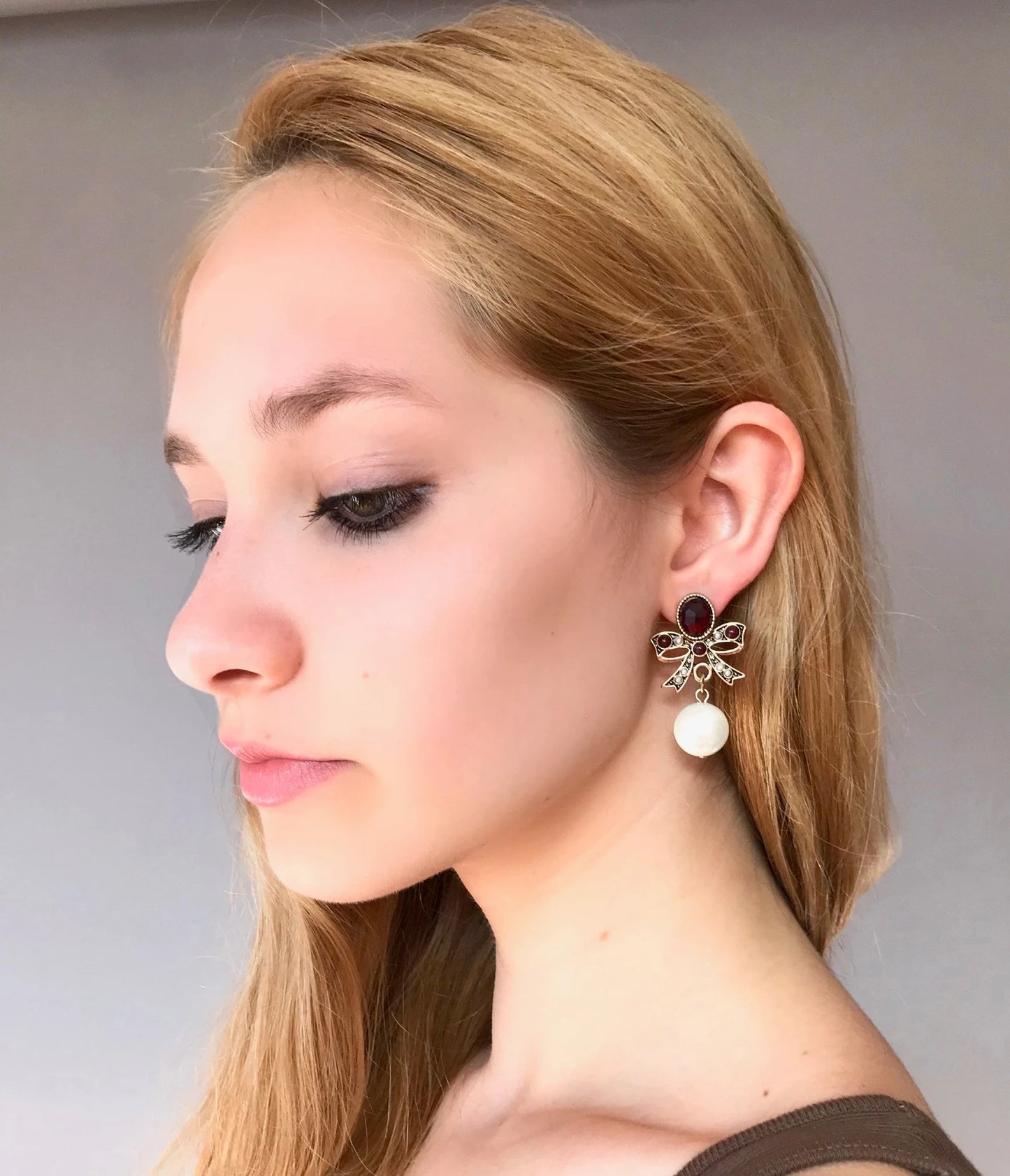 Statement pearl bow earrings