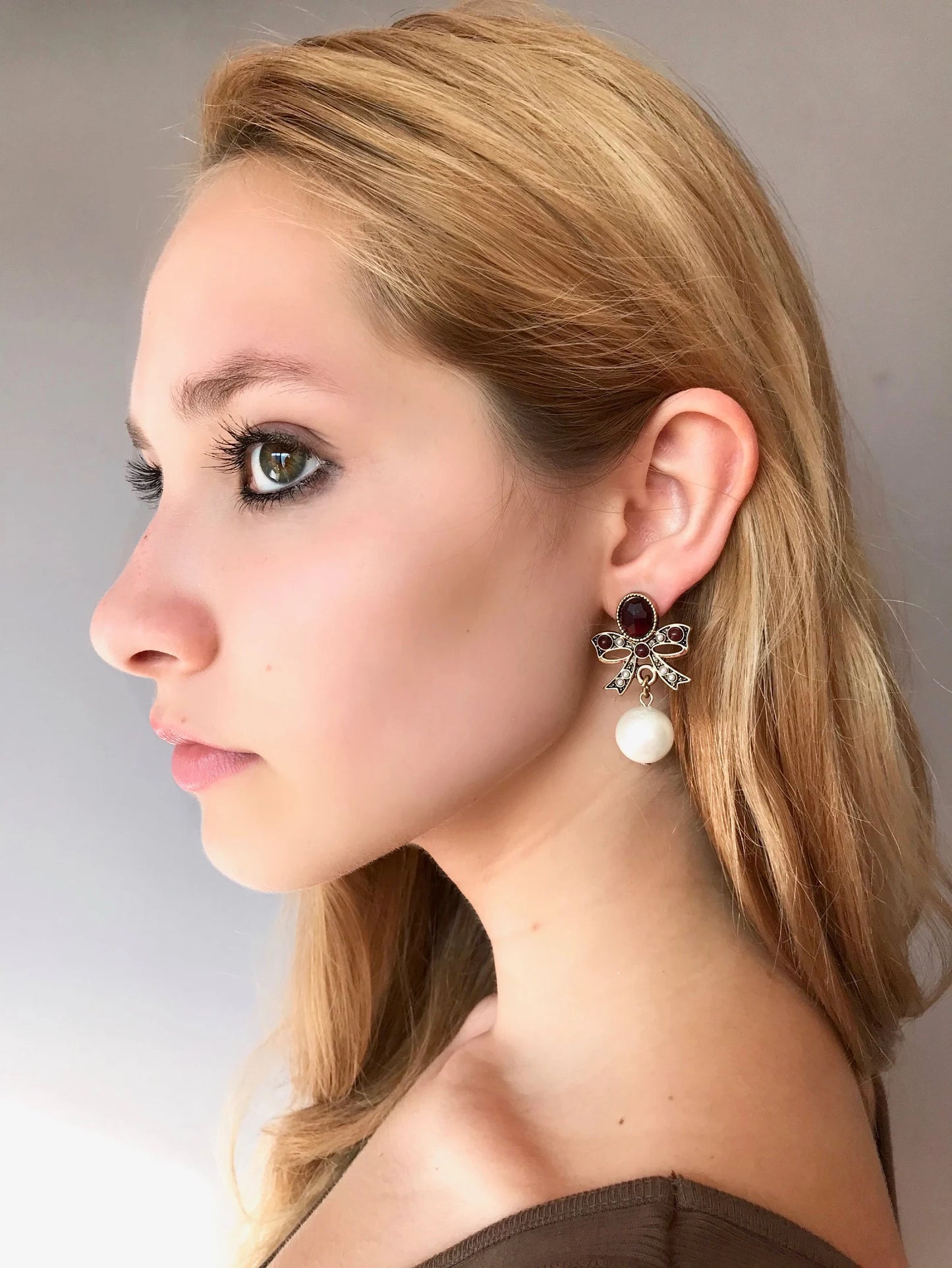 Statement pearl bow earrings