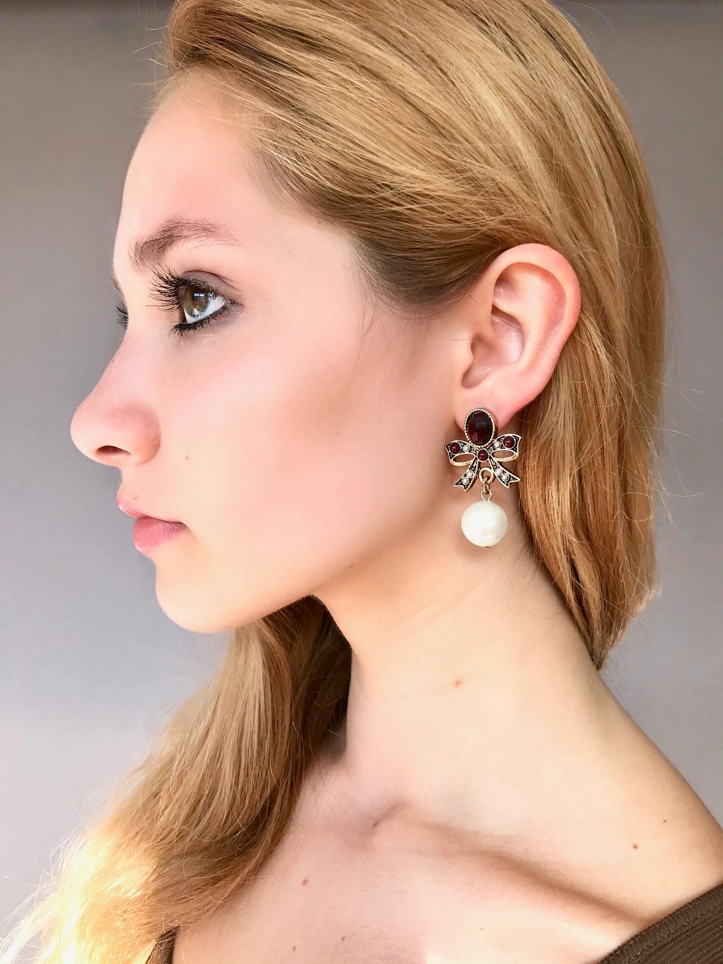 Statement pearl bow earrings