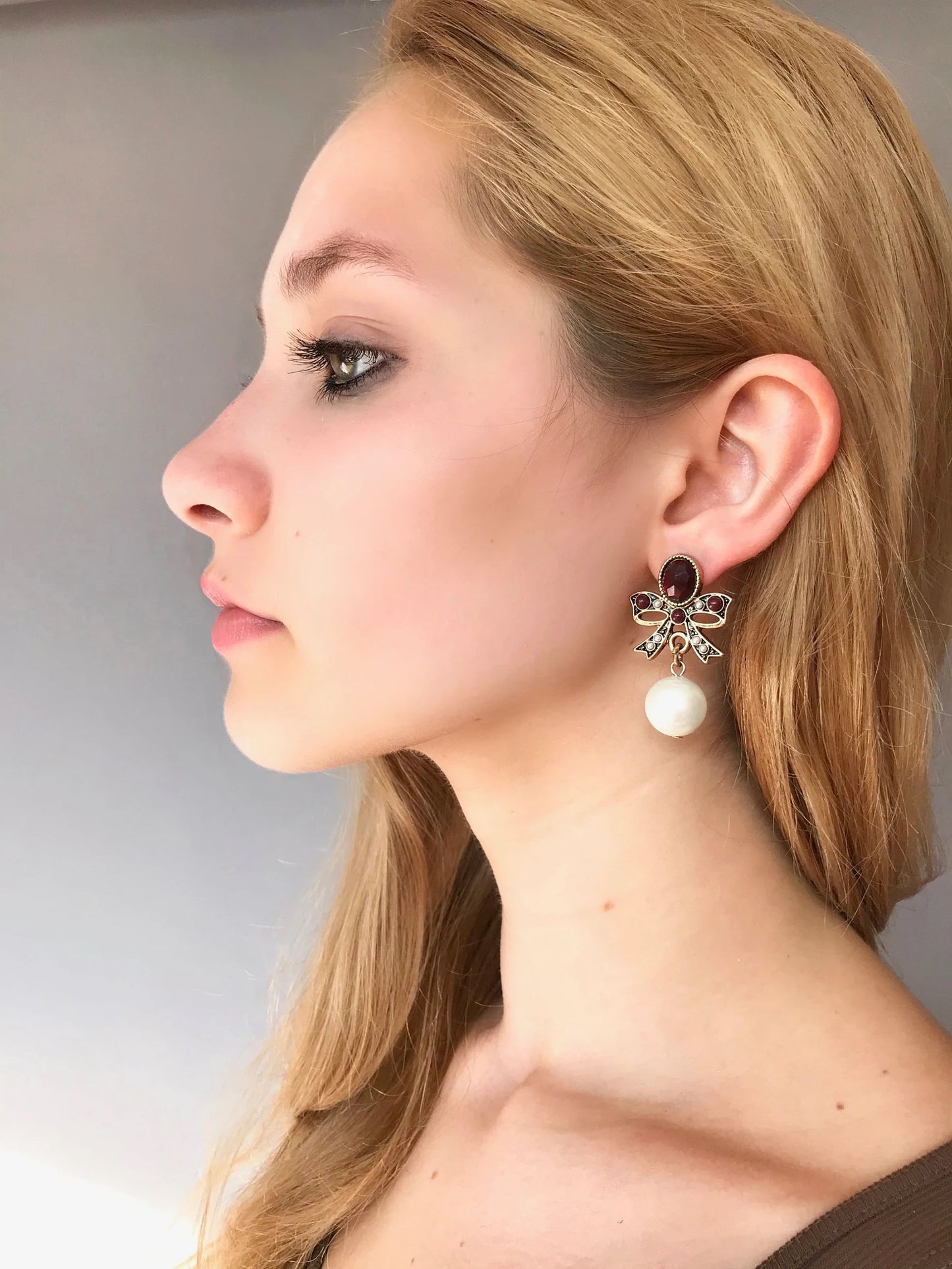 Statement pearl bow earrings