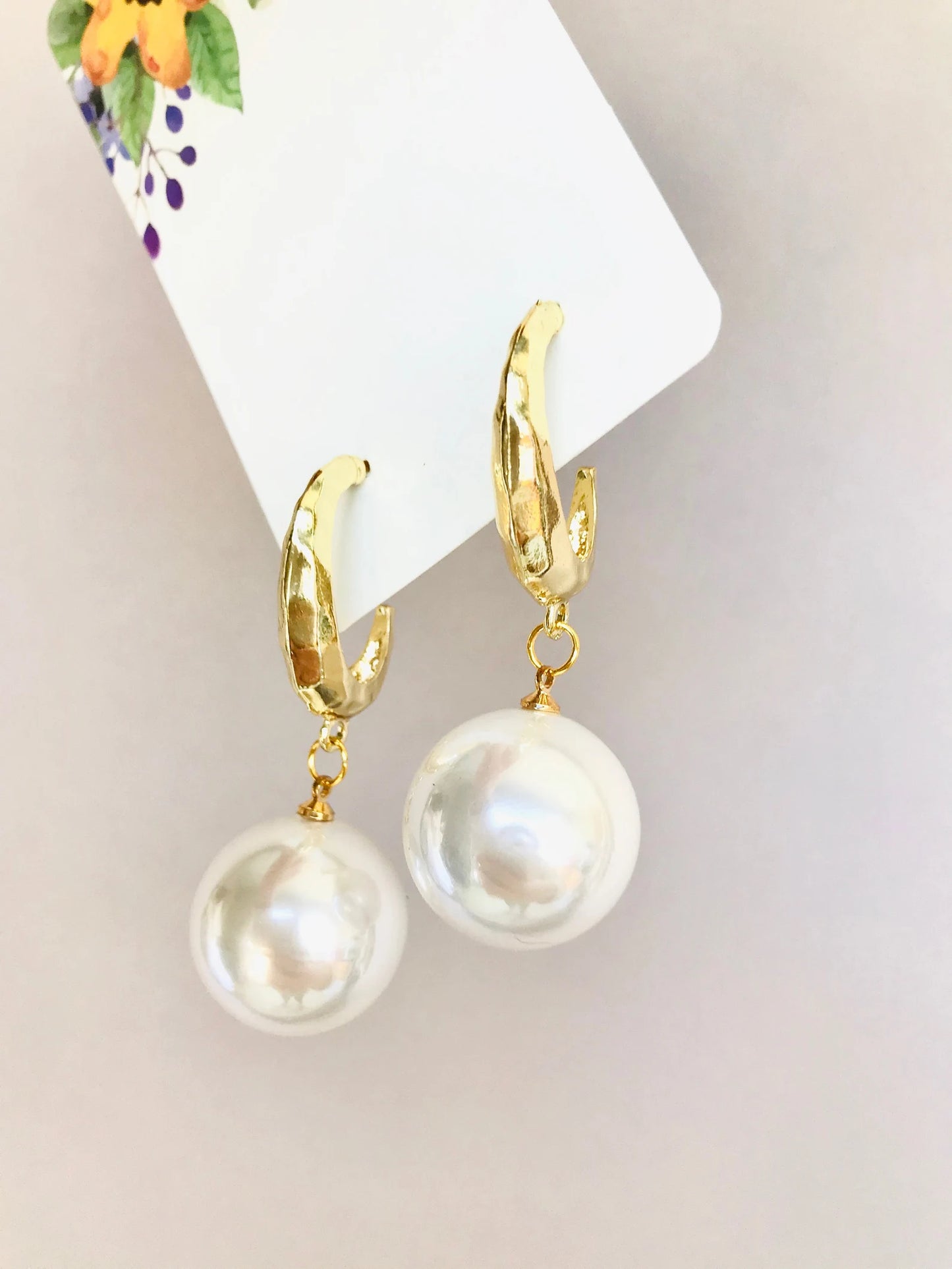 Large pearl earrings