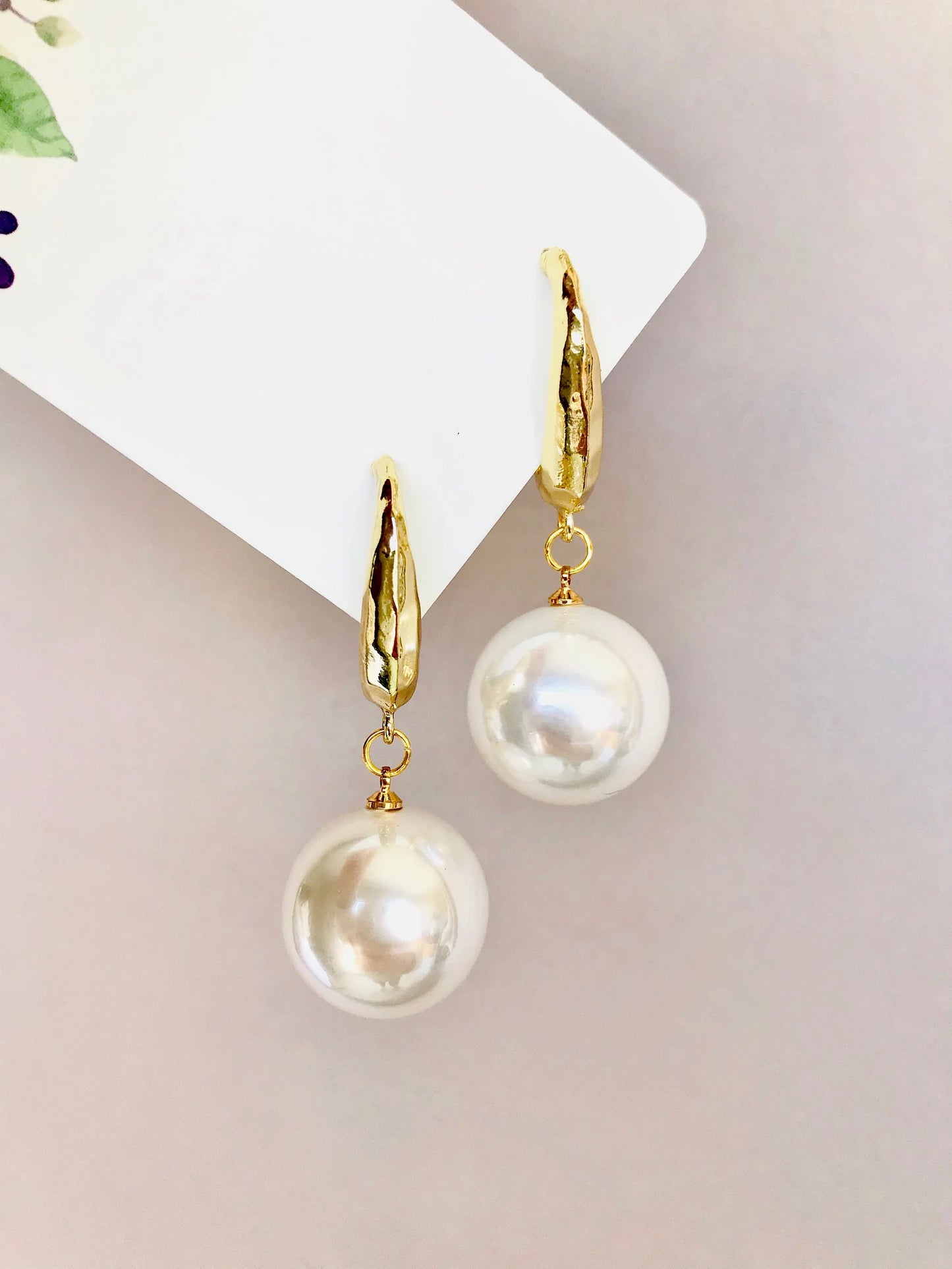 Large pearl earrings