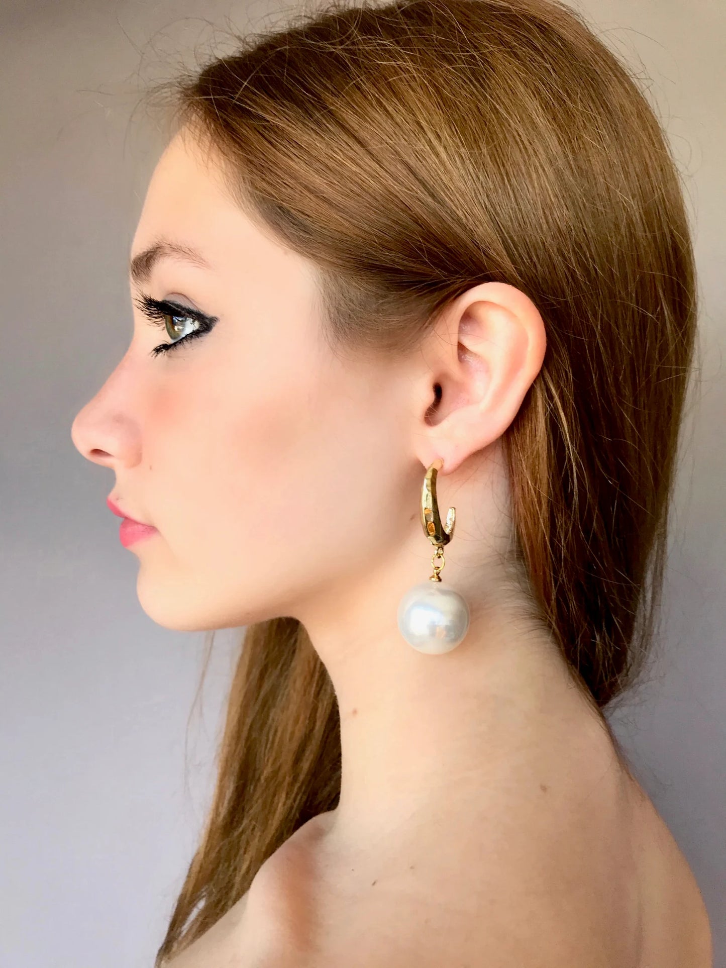 Large pearl earrings