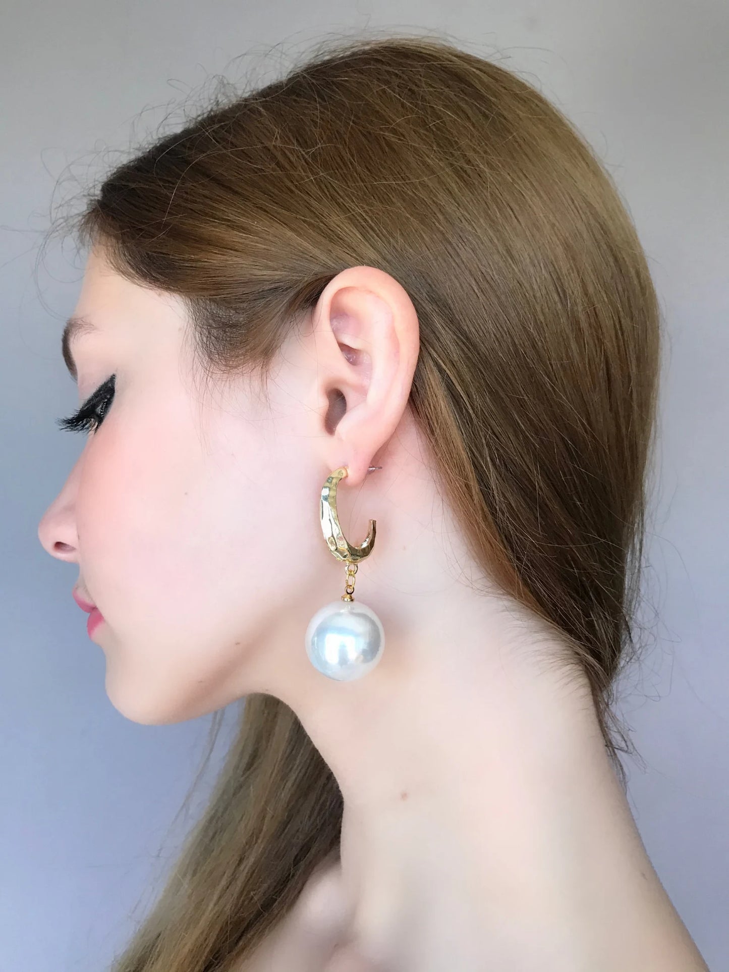 Large pearl earrings