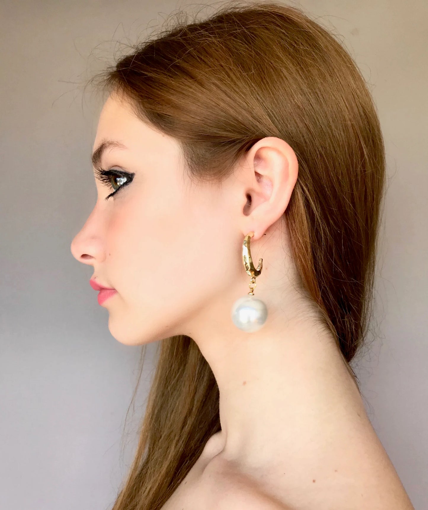 Large pearl earrings