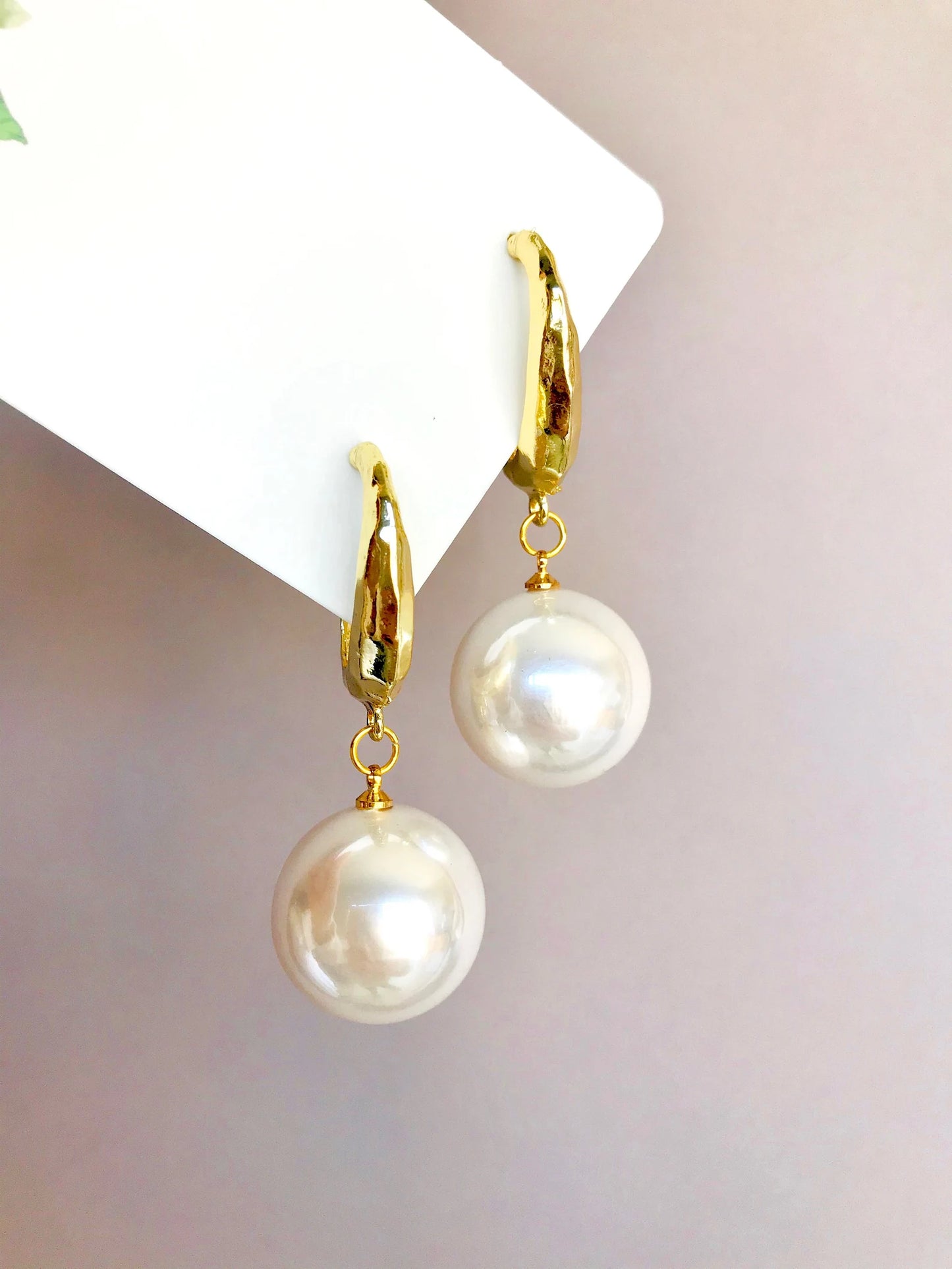 Large pearl earrings