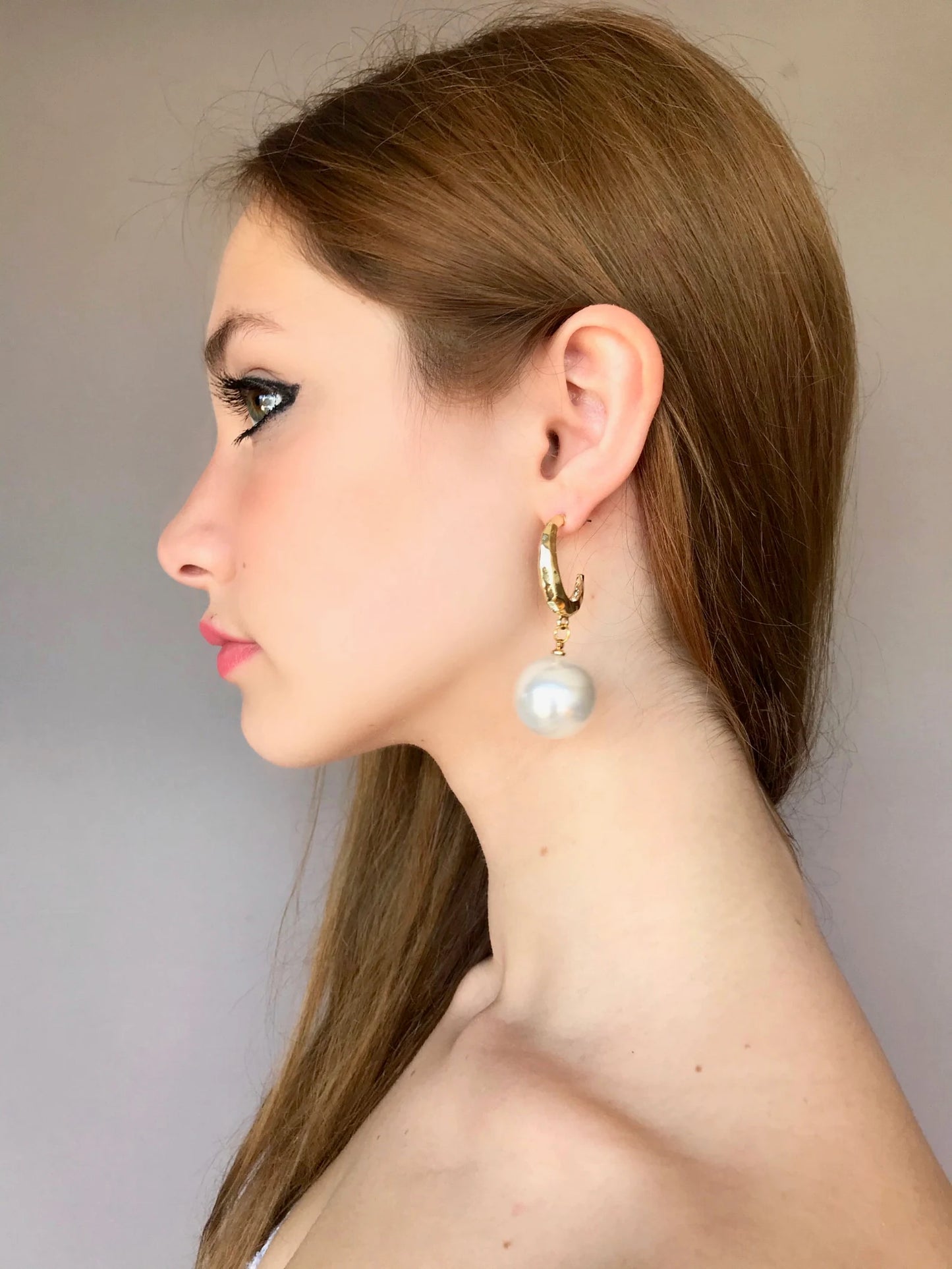 Large pearl earrings