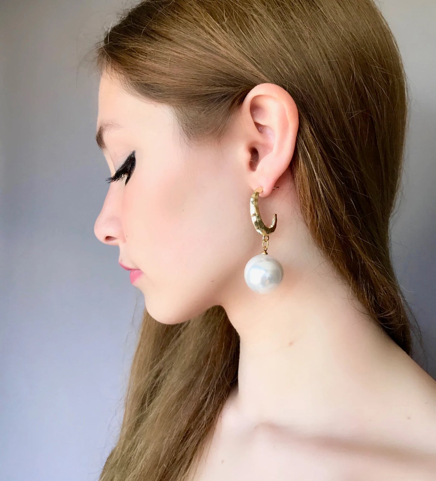 Large pearl earrings