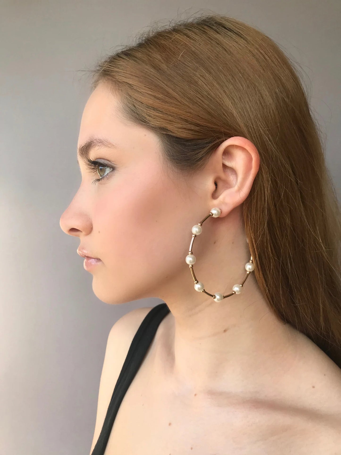 Large pearl hoop earrings