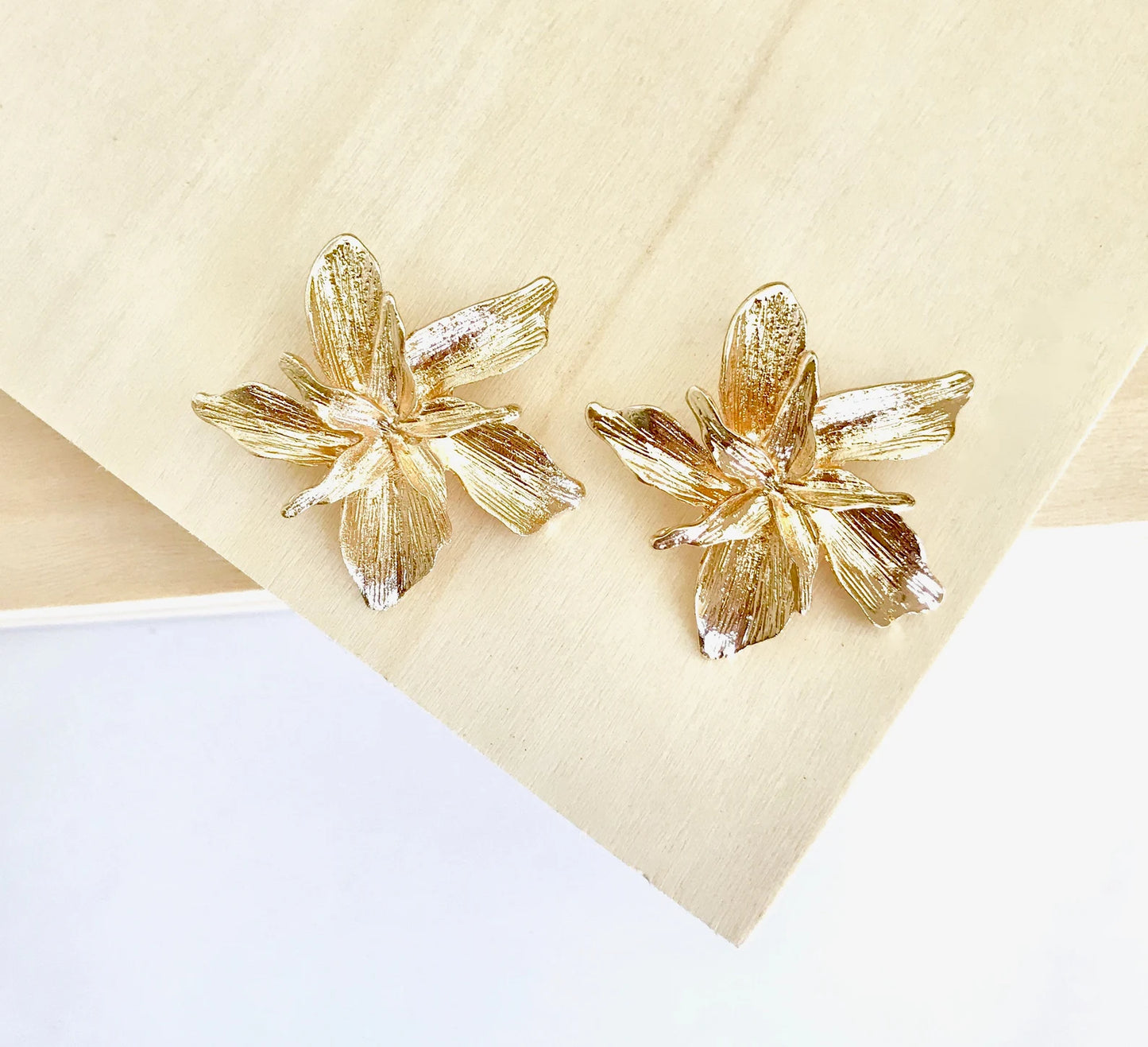 Gold flower earrings