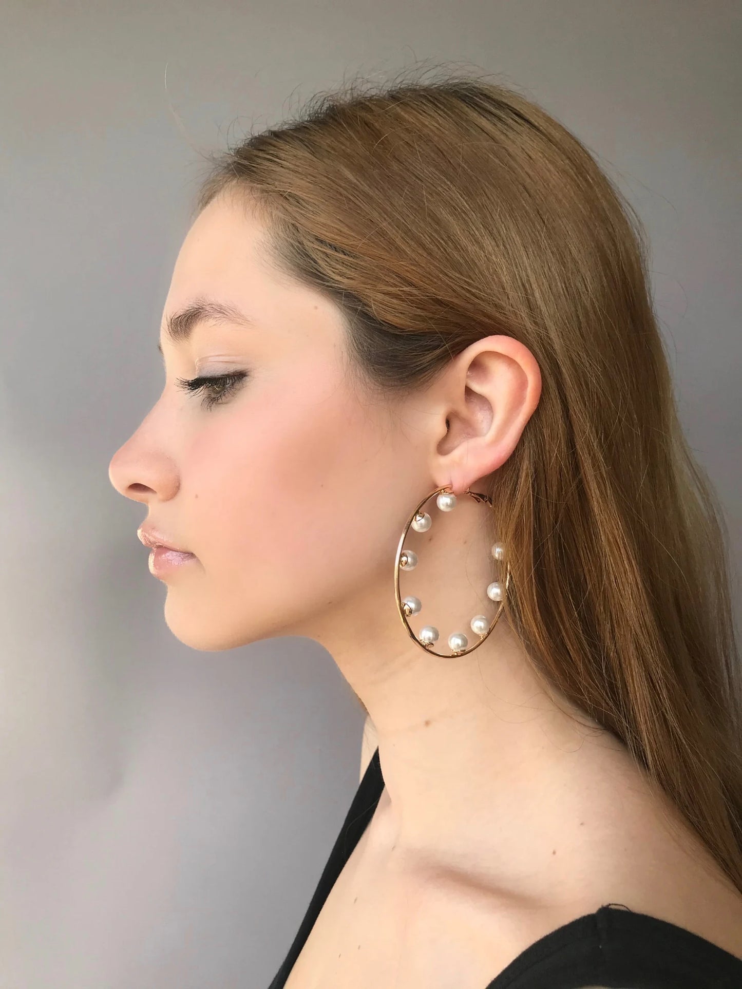 Large pearl hoop earrings