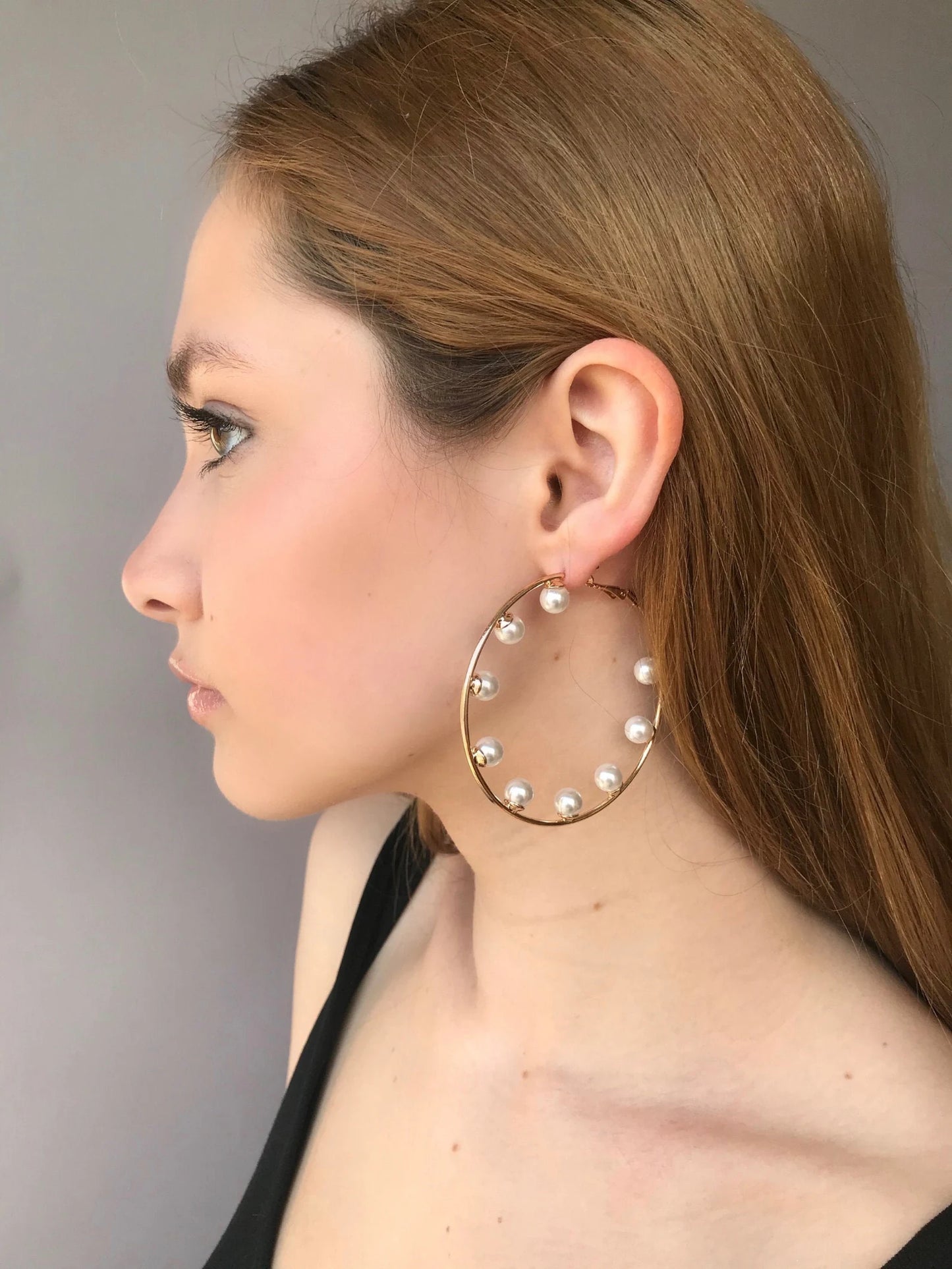 Large pearl hoop earrings