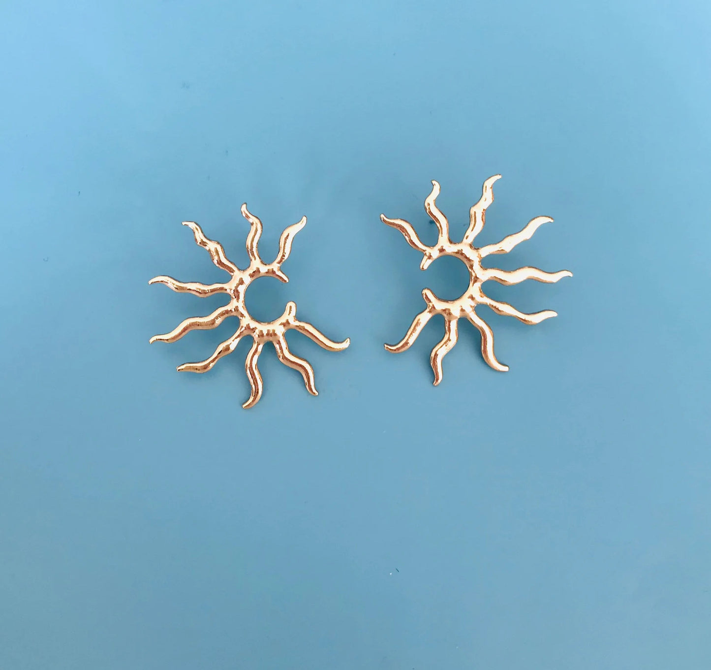 Gold star earrings