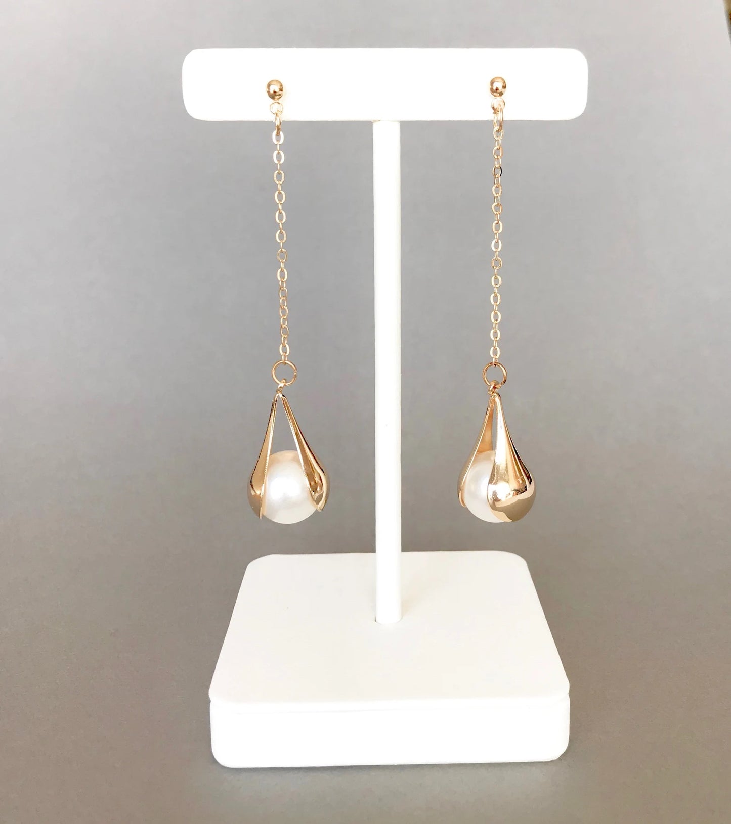 Big pearl drop earrings