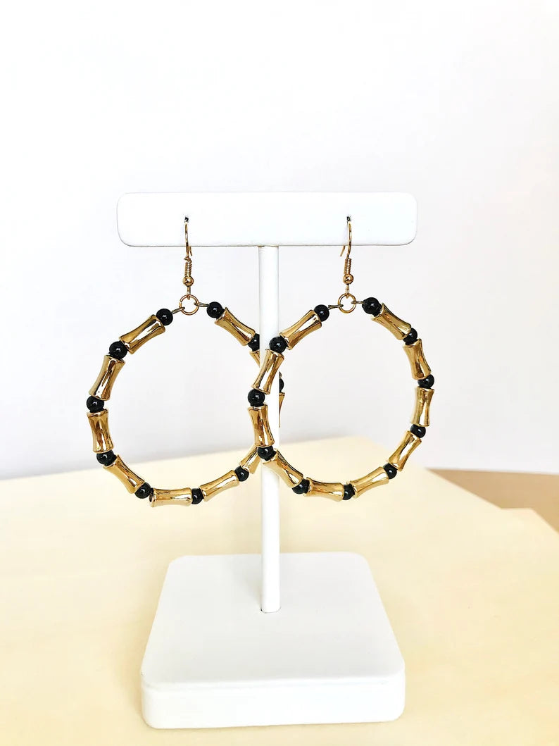 Black and gold statement hoop earrings