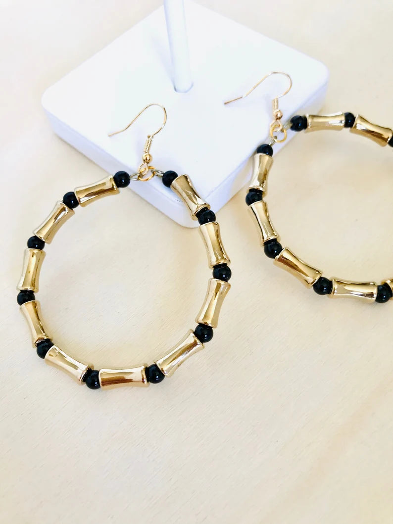 Black and gold statement hoop earrings