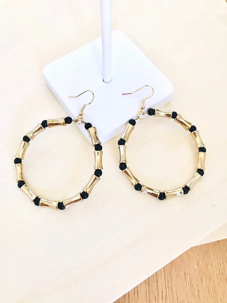 Black and gold statement hoop earrings