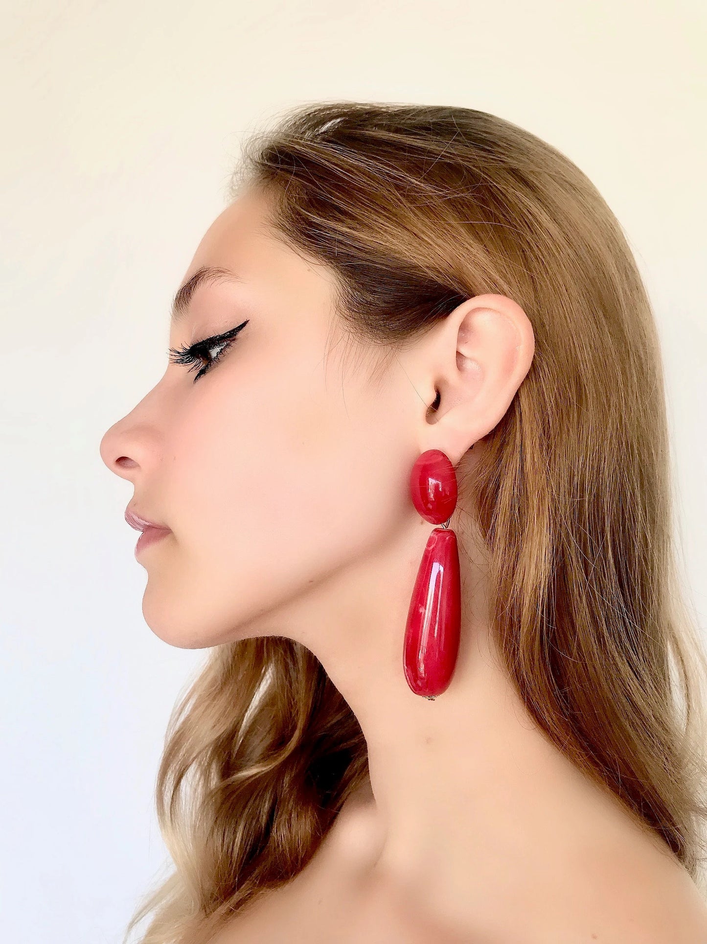 Large red teardrop statement earrings