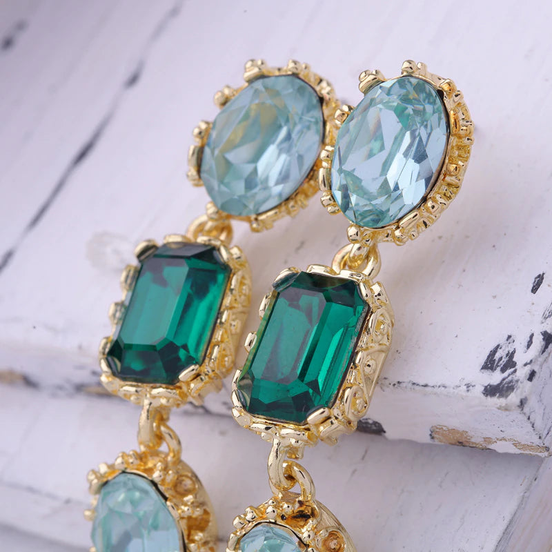 Green crystal long drop earrings