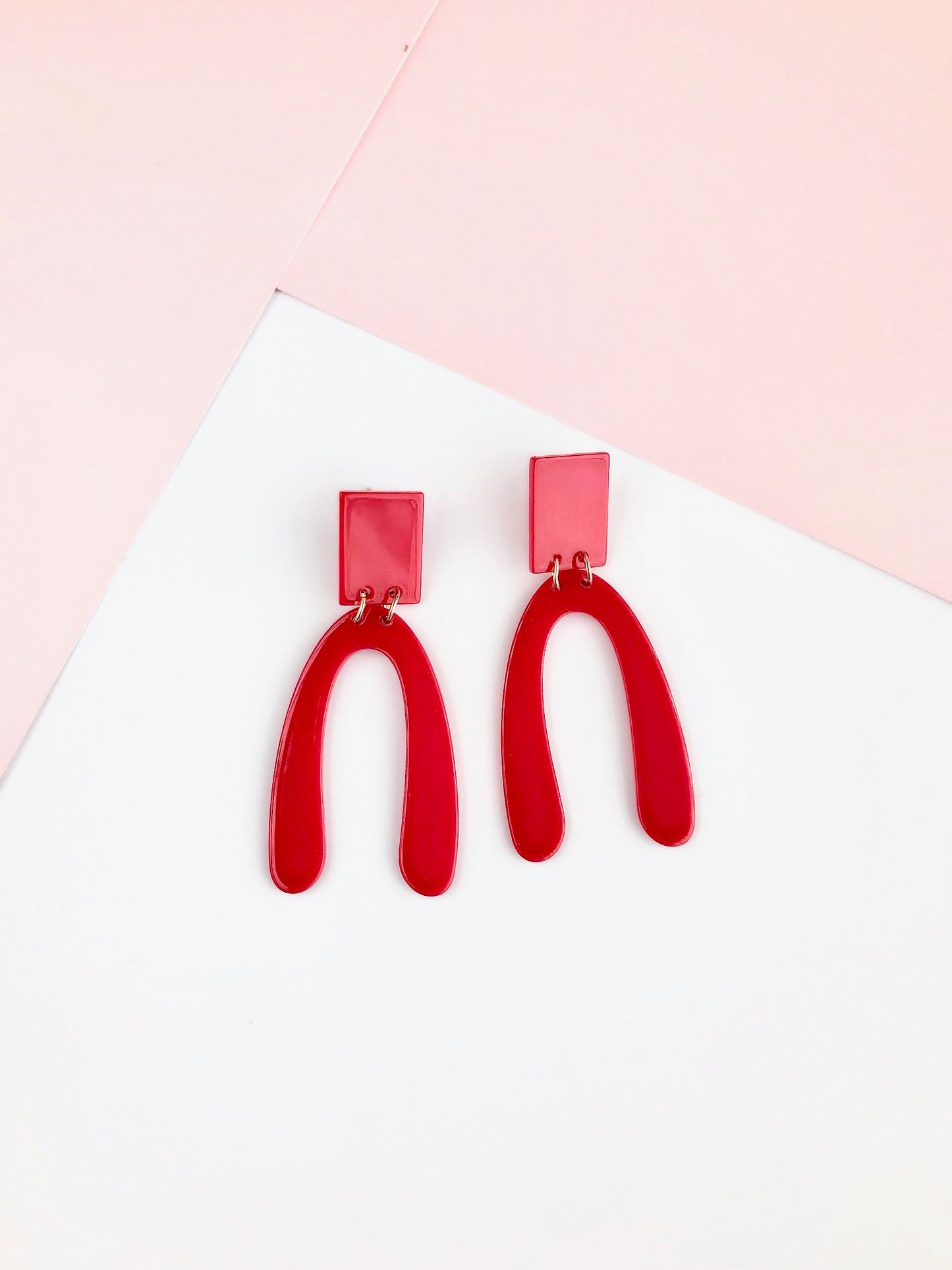 Red arch earrings