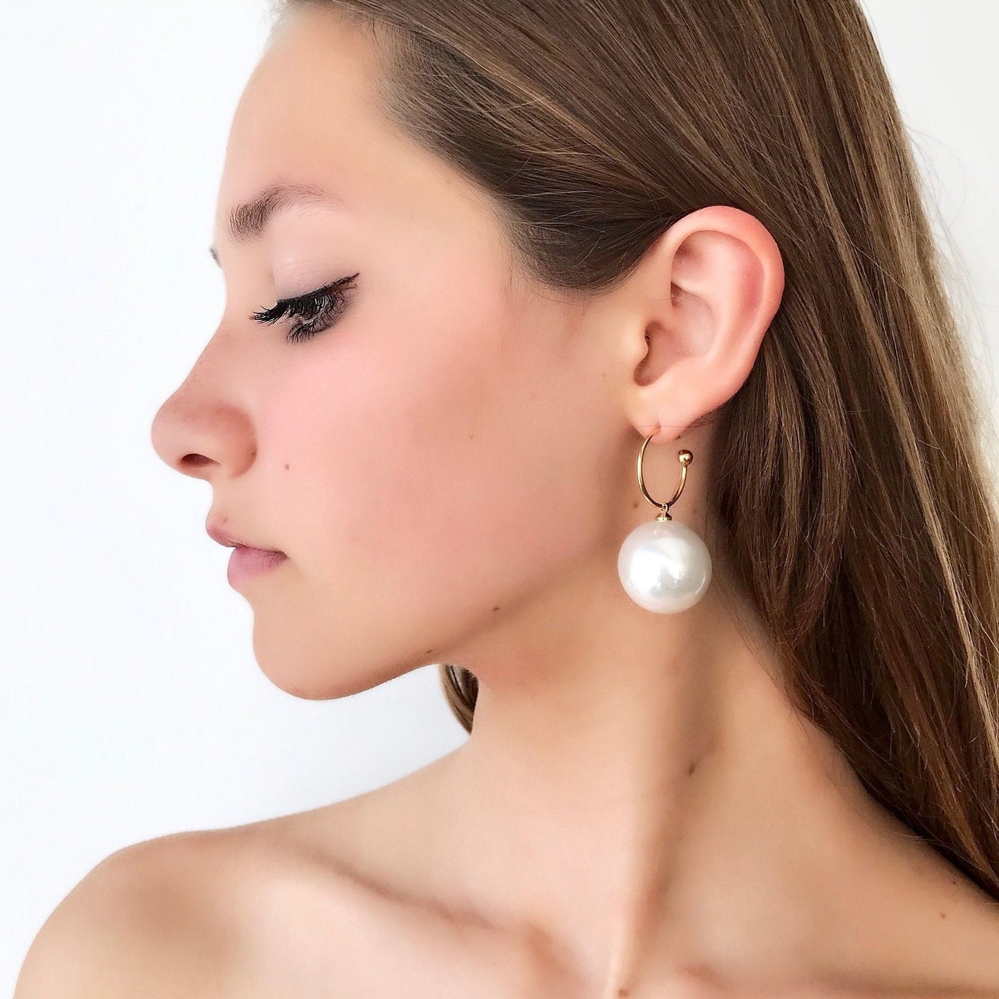 Large pearl statement earrings