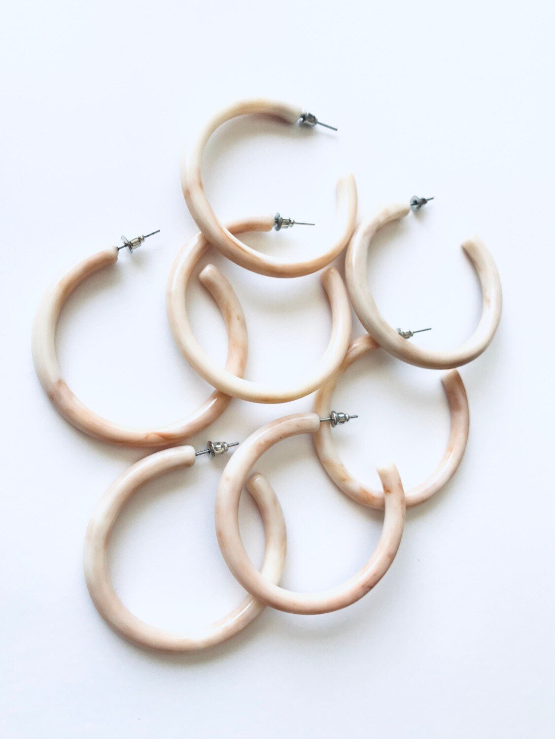 Large beige hoop earrings