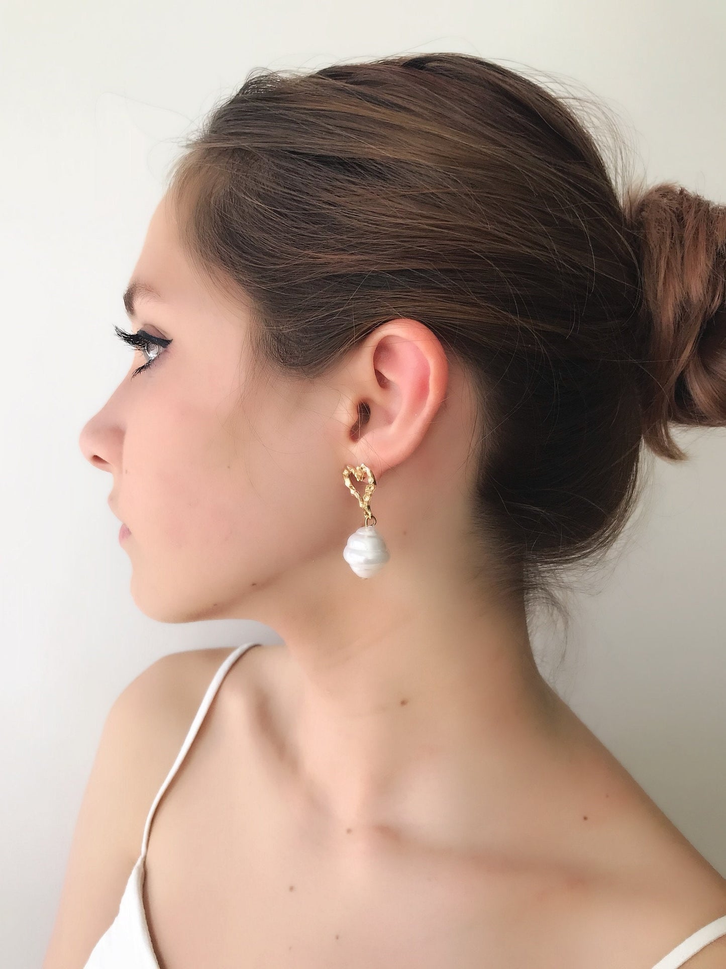 Large pearl earrings