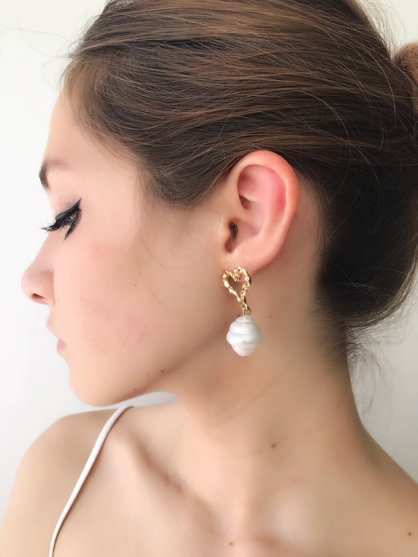 Large pearl earrings