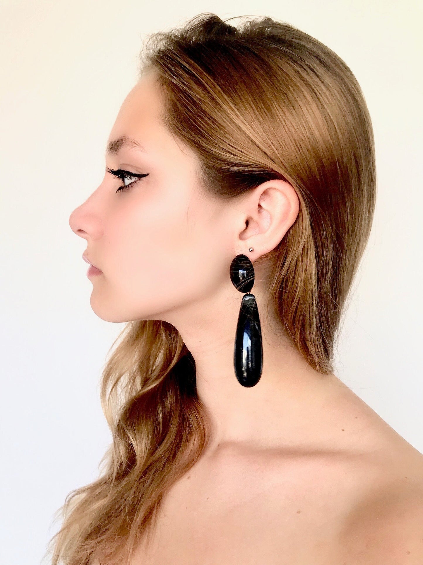 Black statement earrings