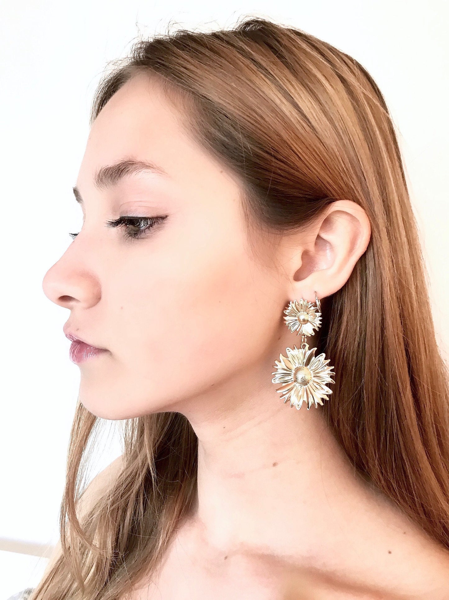 Gold flower drop earrings