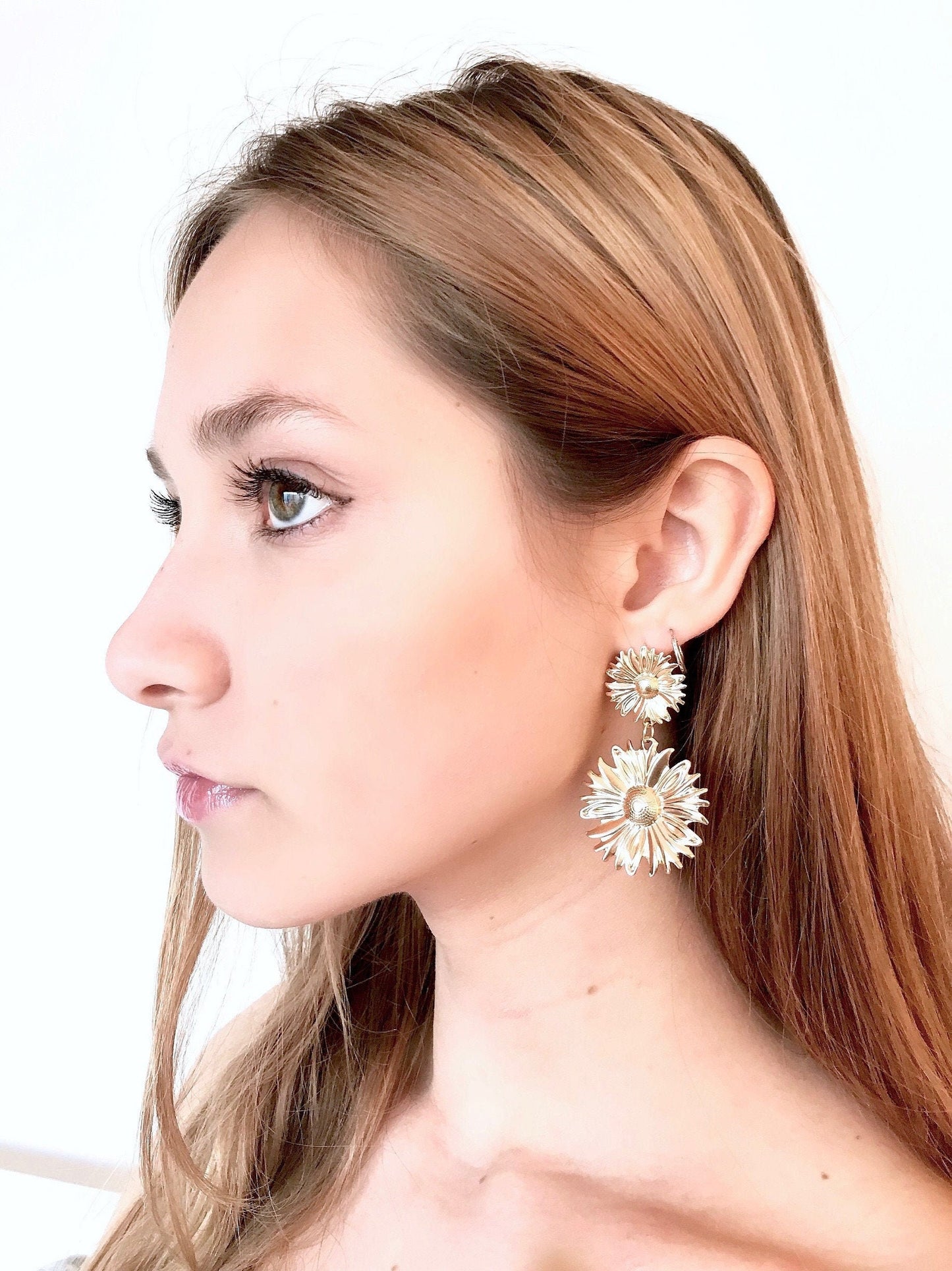Gold flower drop earrings