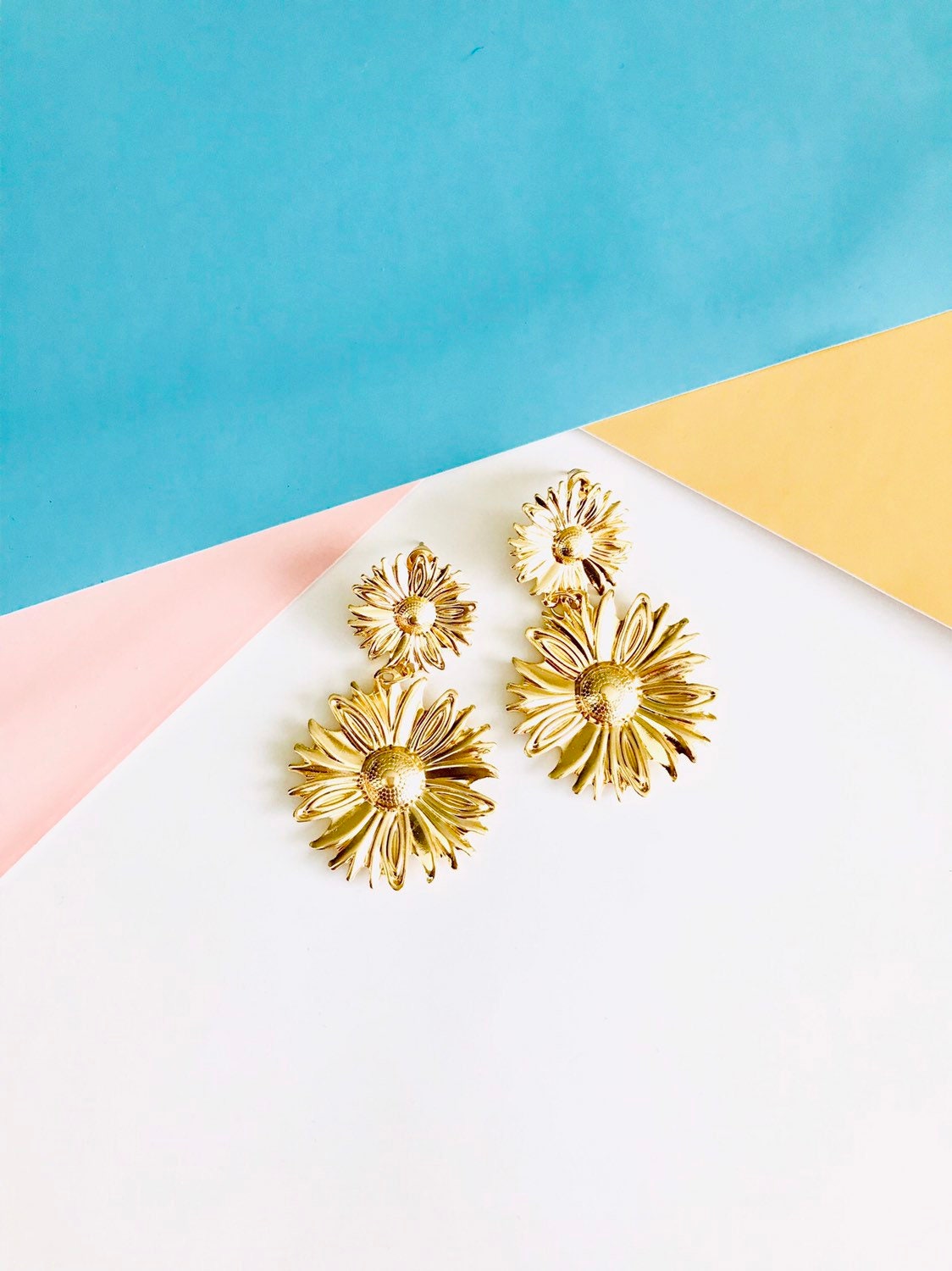 Gold flower drop earrings