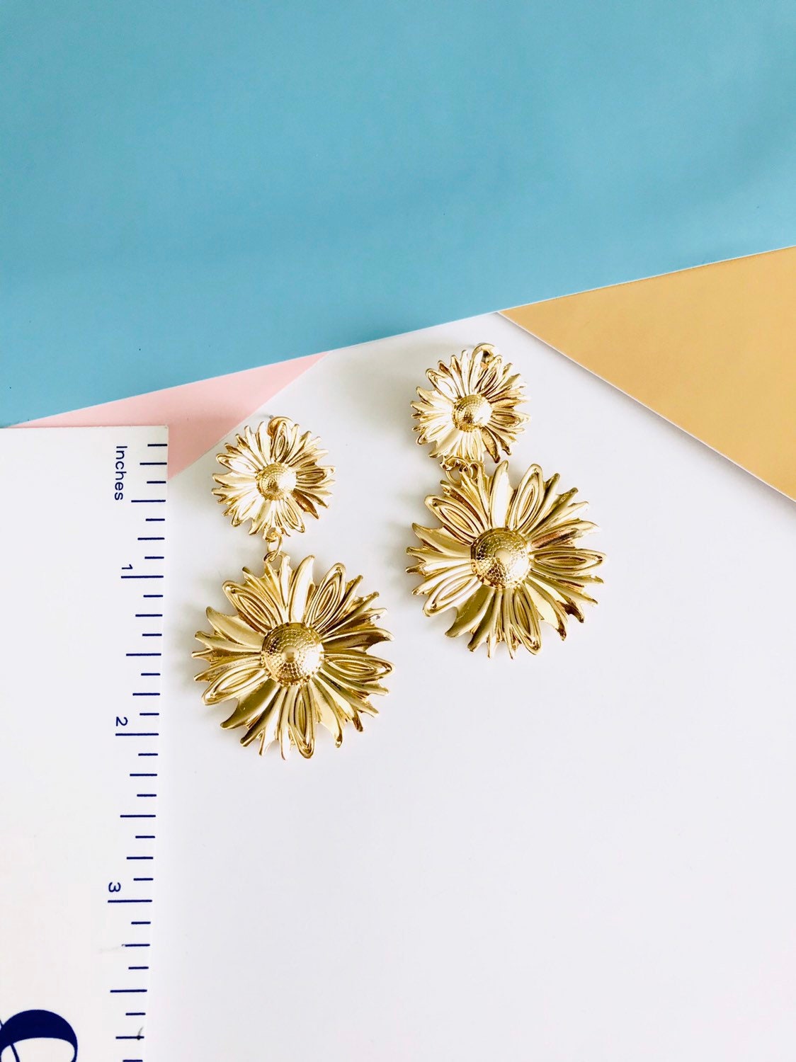 Gold flower drop earrings