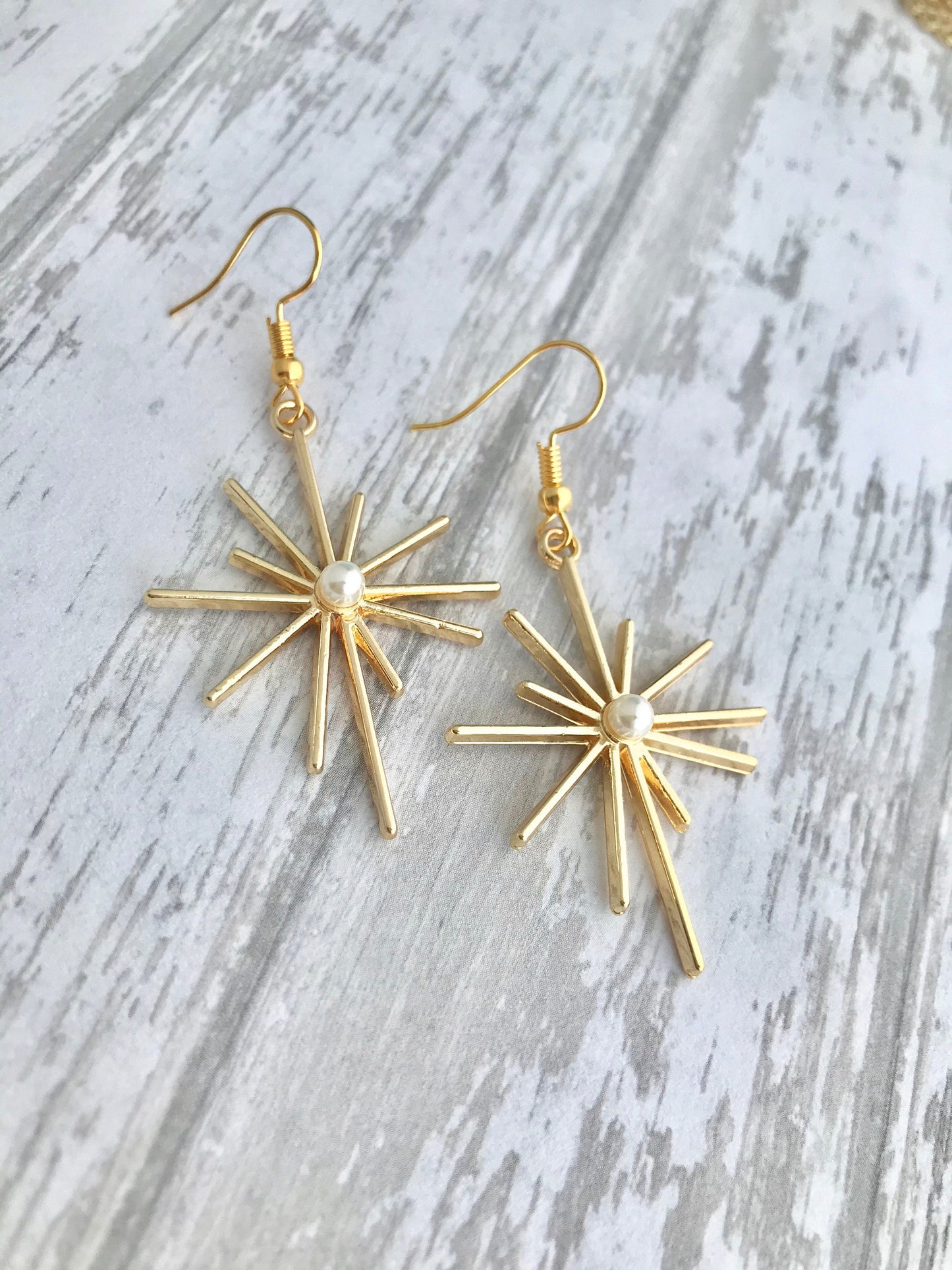 Gold star celestial earrings