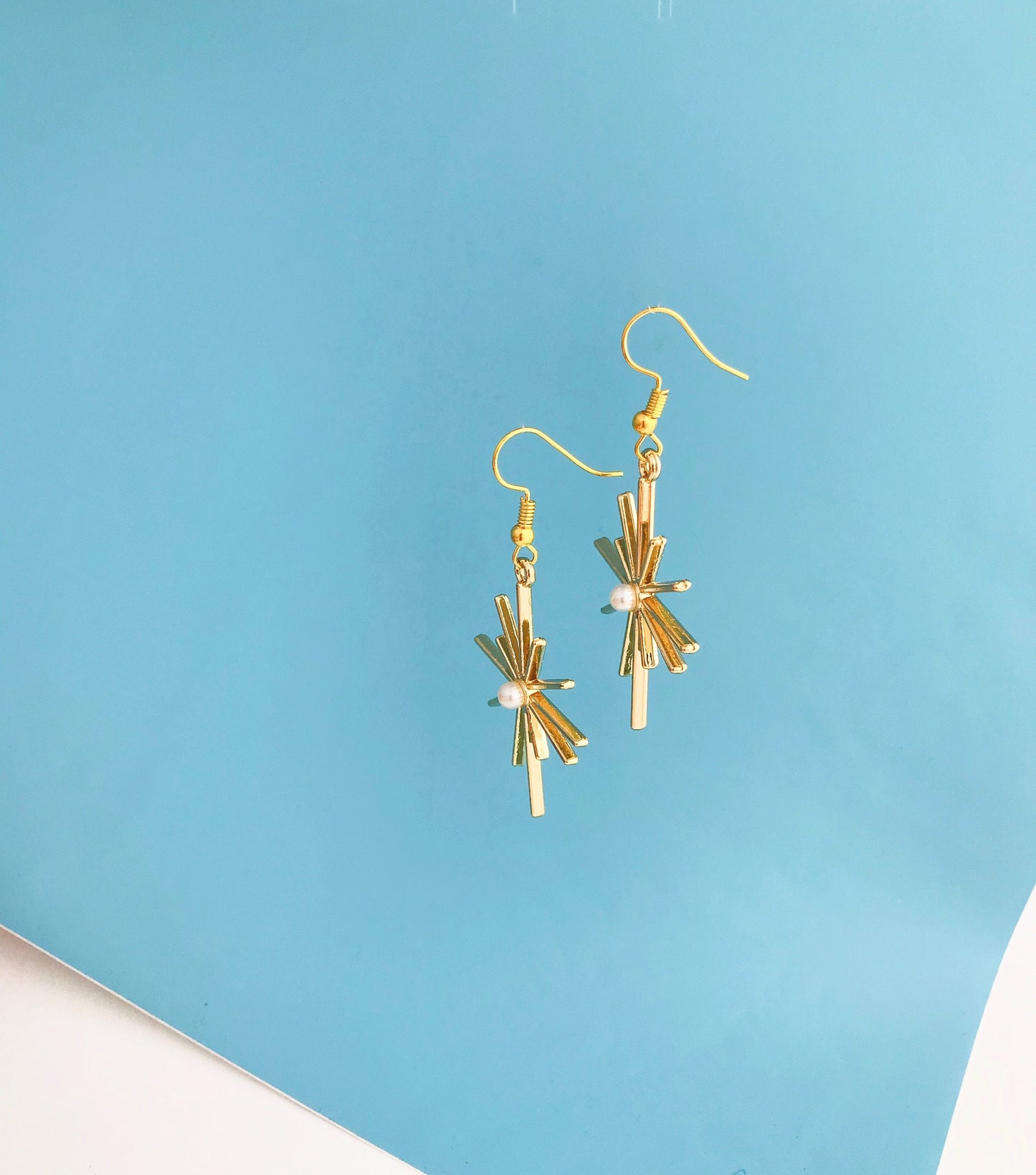 Gold star celestial earrings