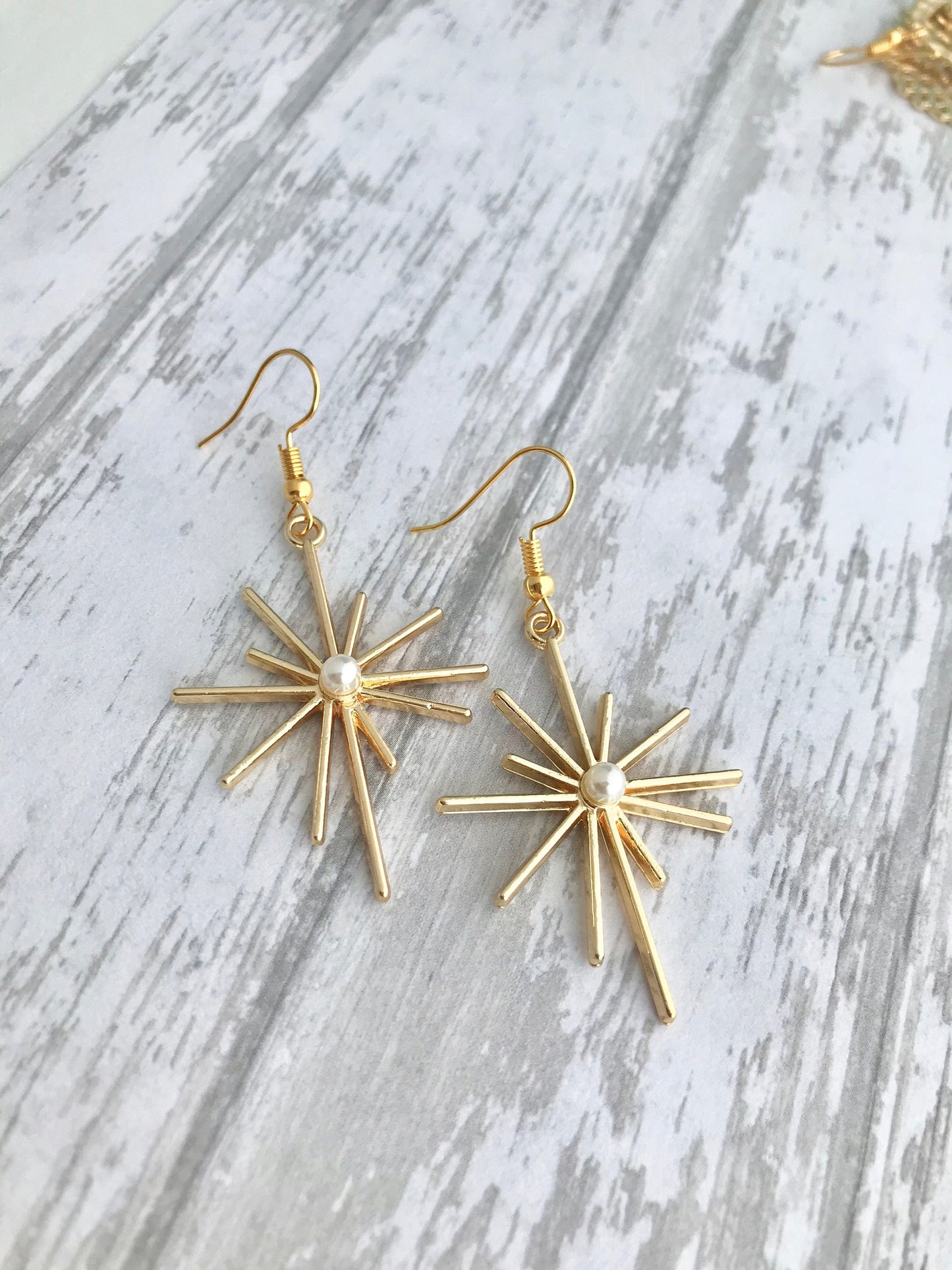 Gold star celestial earrings