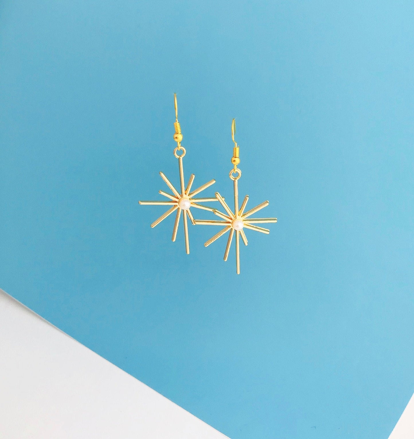 Gold star celestial earrings