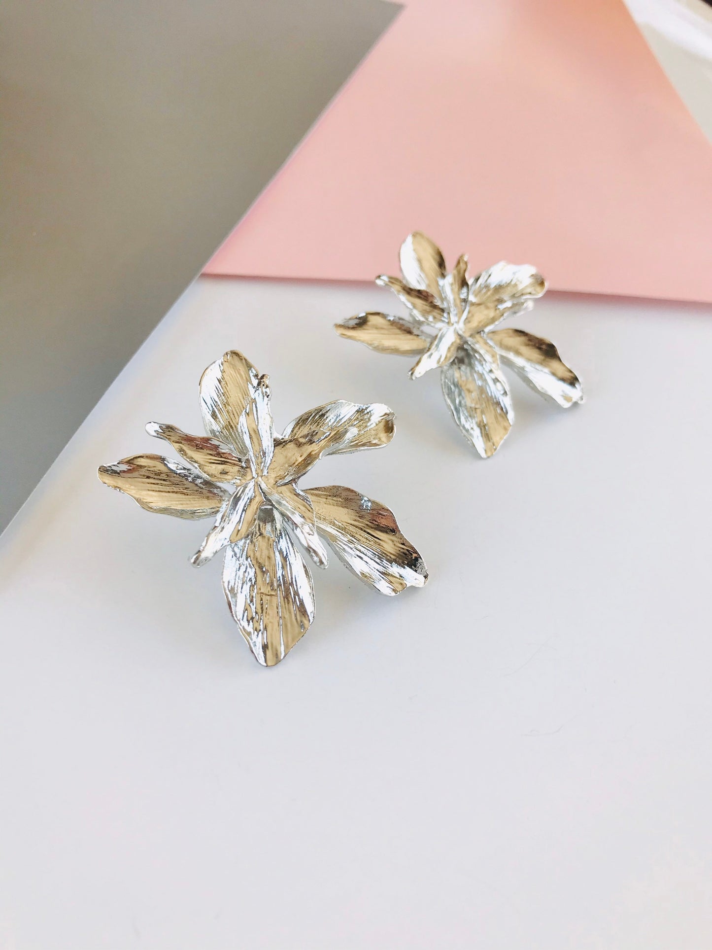 Large gold flower earrings