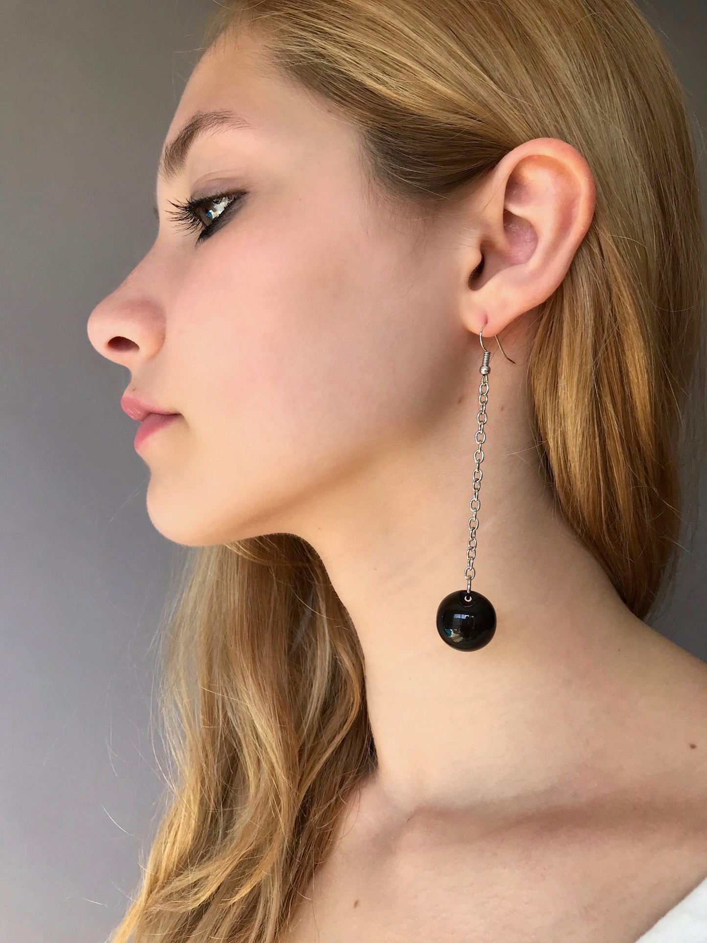 Black ball drop geometric earrings