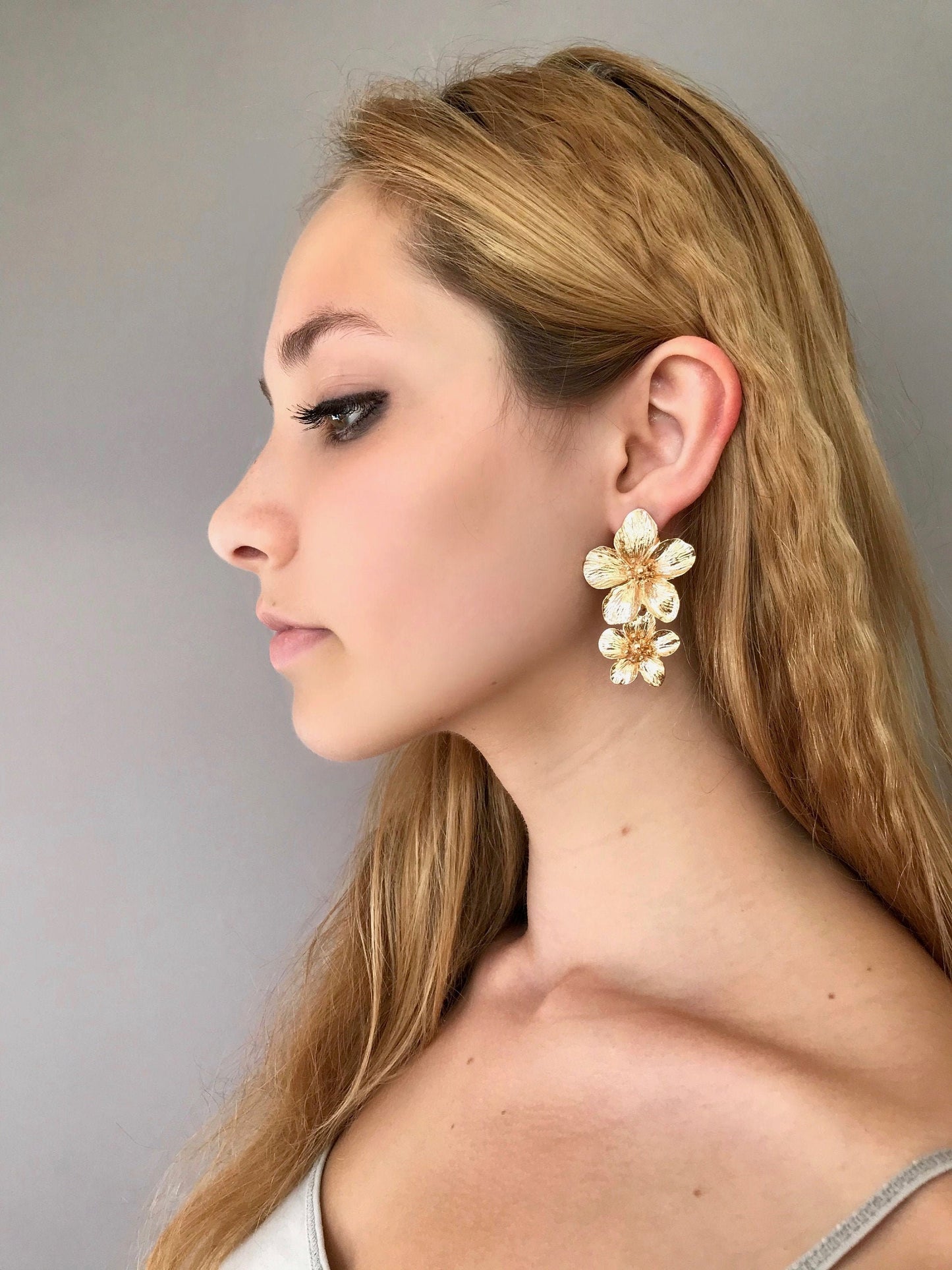 Gold flower drop earrings