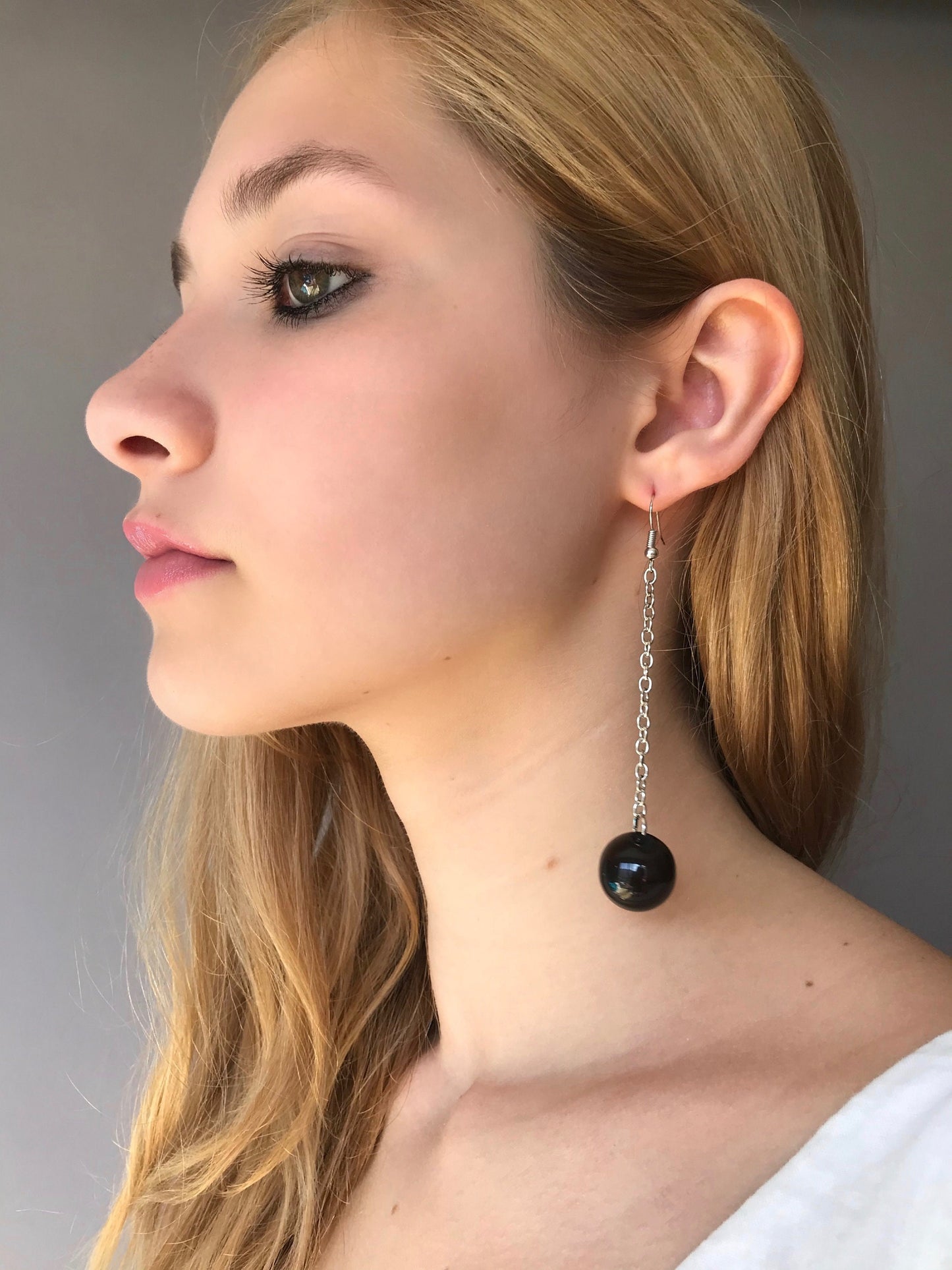 Black ball drop geometric earrings