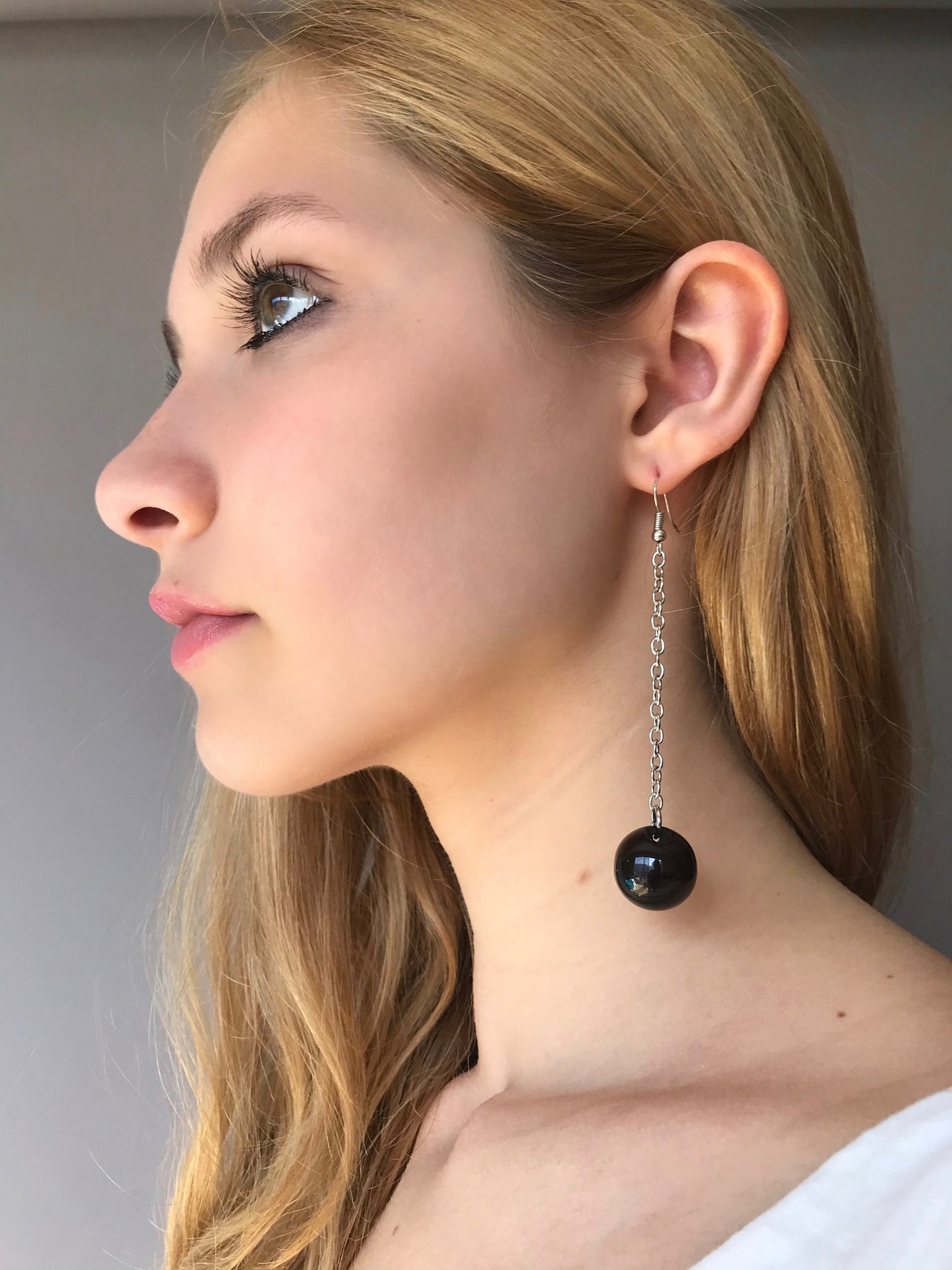 Black ball drop geometric earrings